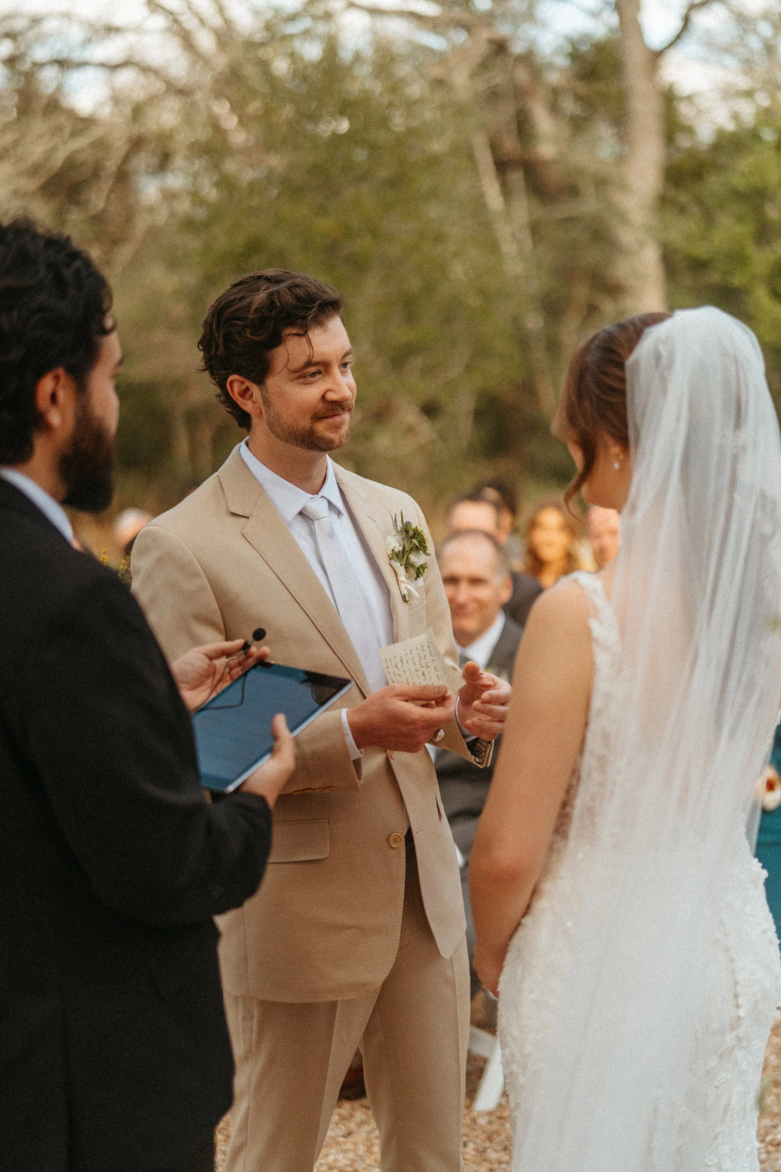 Wedding vows exchanged beneath oak trees at The Grand Lady Austin
