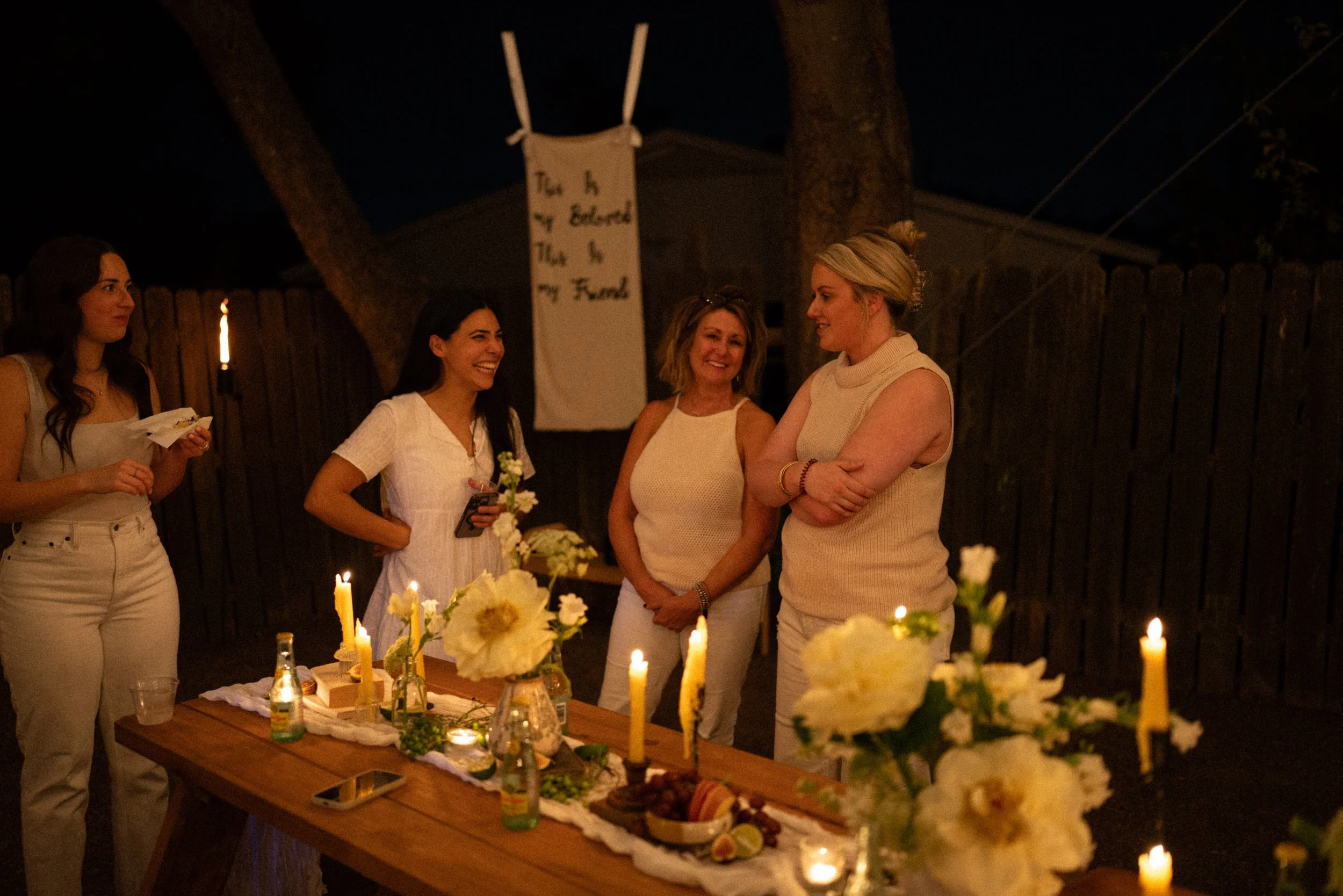 Surprise engagement party in Austin with custom charcuterie board and speeches