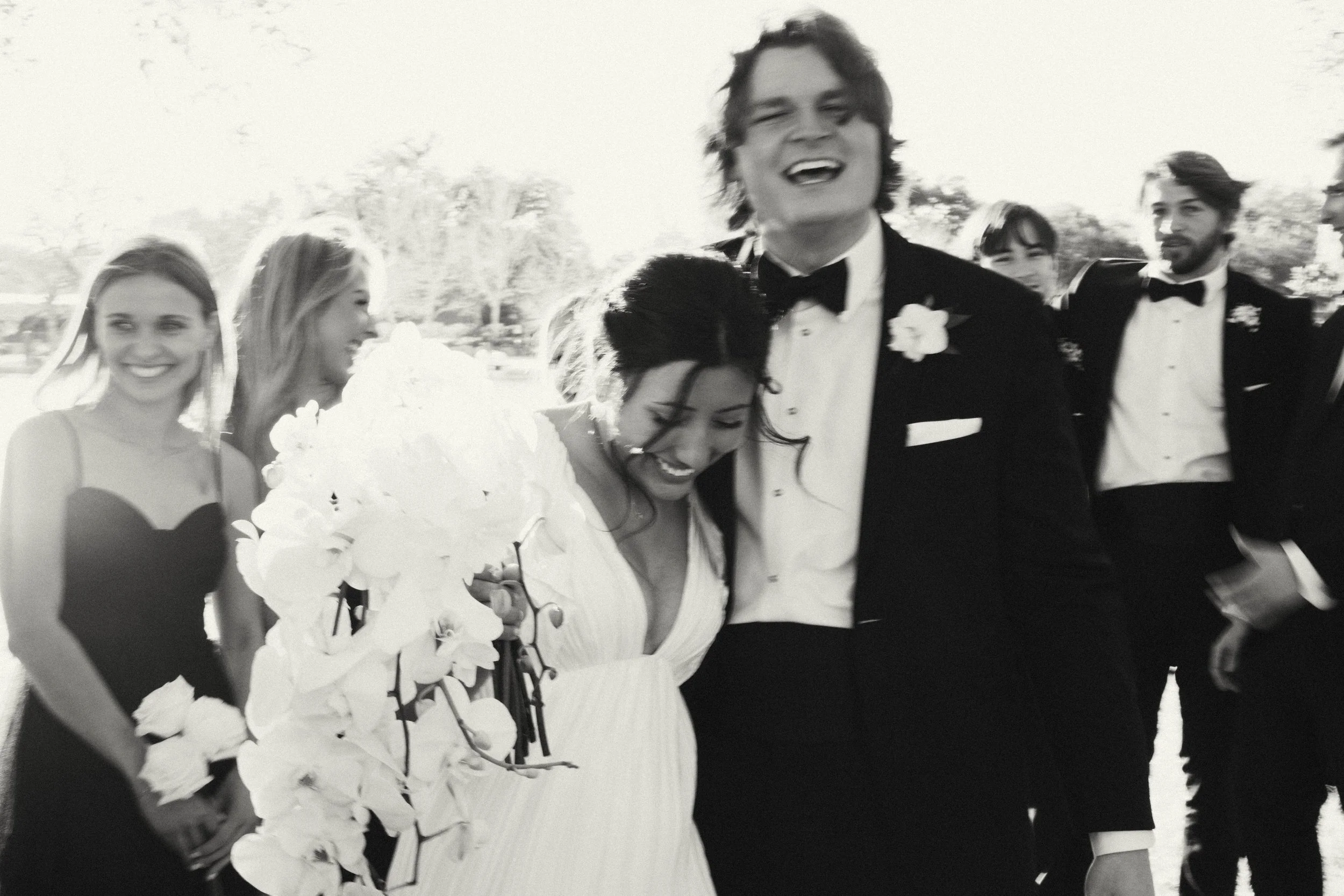 Couple laughing together during Houston Oaks wedding portraits | Austin travel wedding photographer