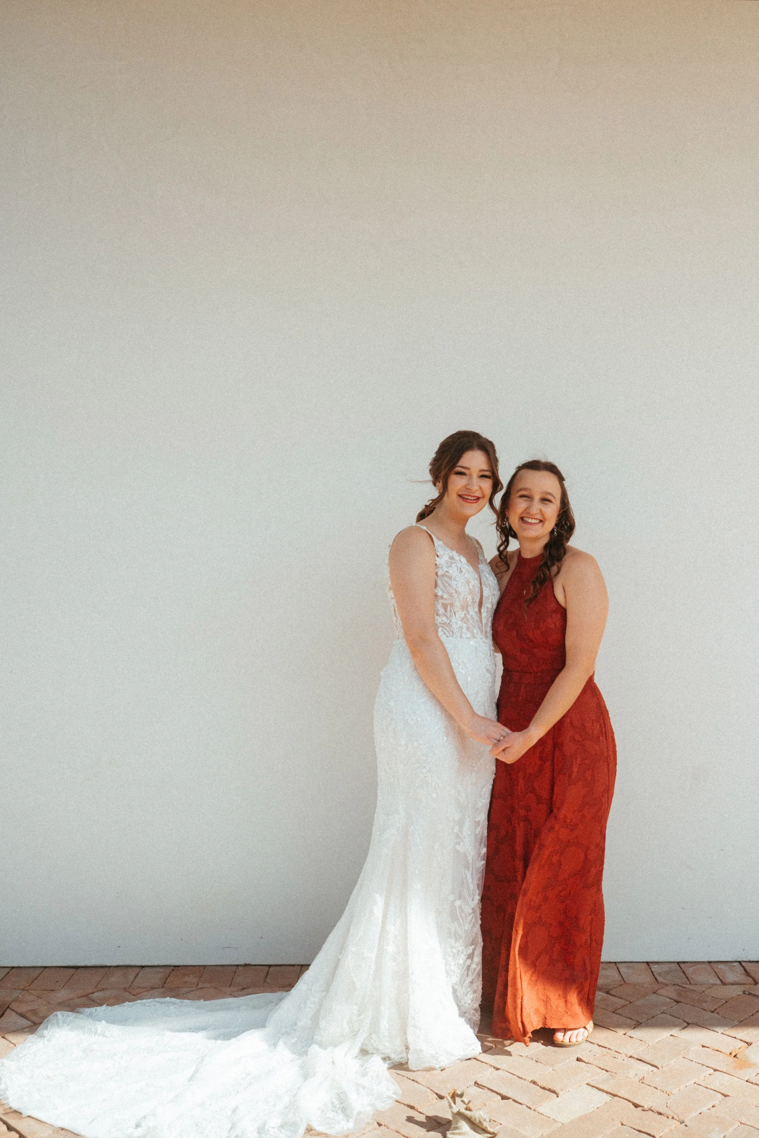 Bridesmaids in beautiful red bridesmaids dresses at The Grand Lady Austin wedding