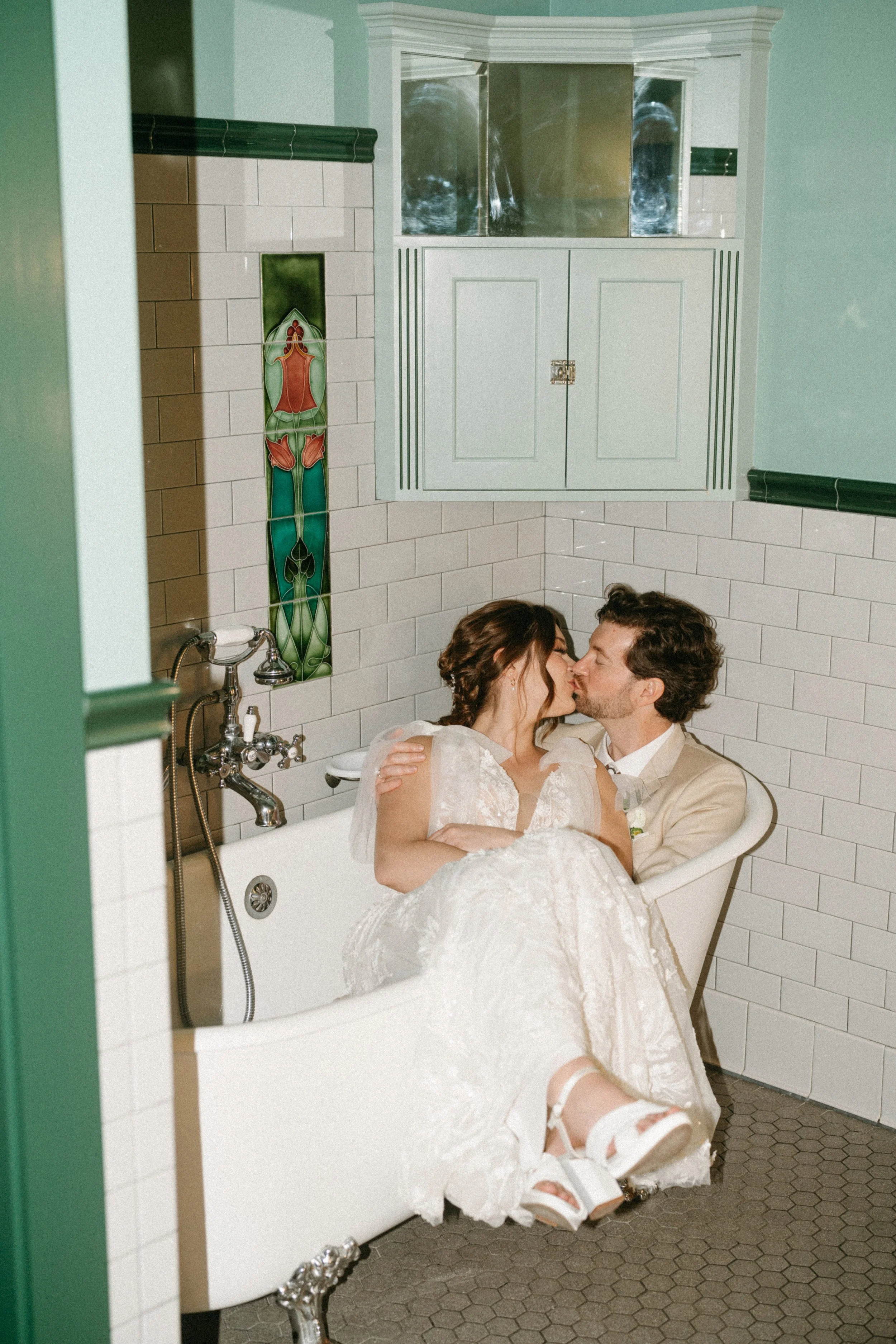 Joyful couple portrait in mansion bathroom at The Grand Lady in austin tx