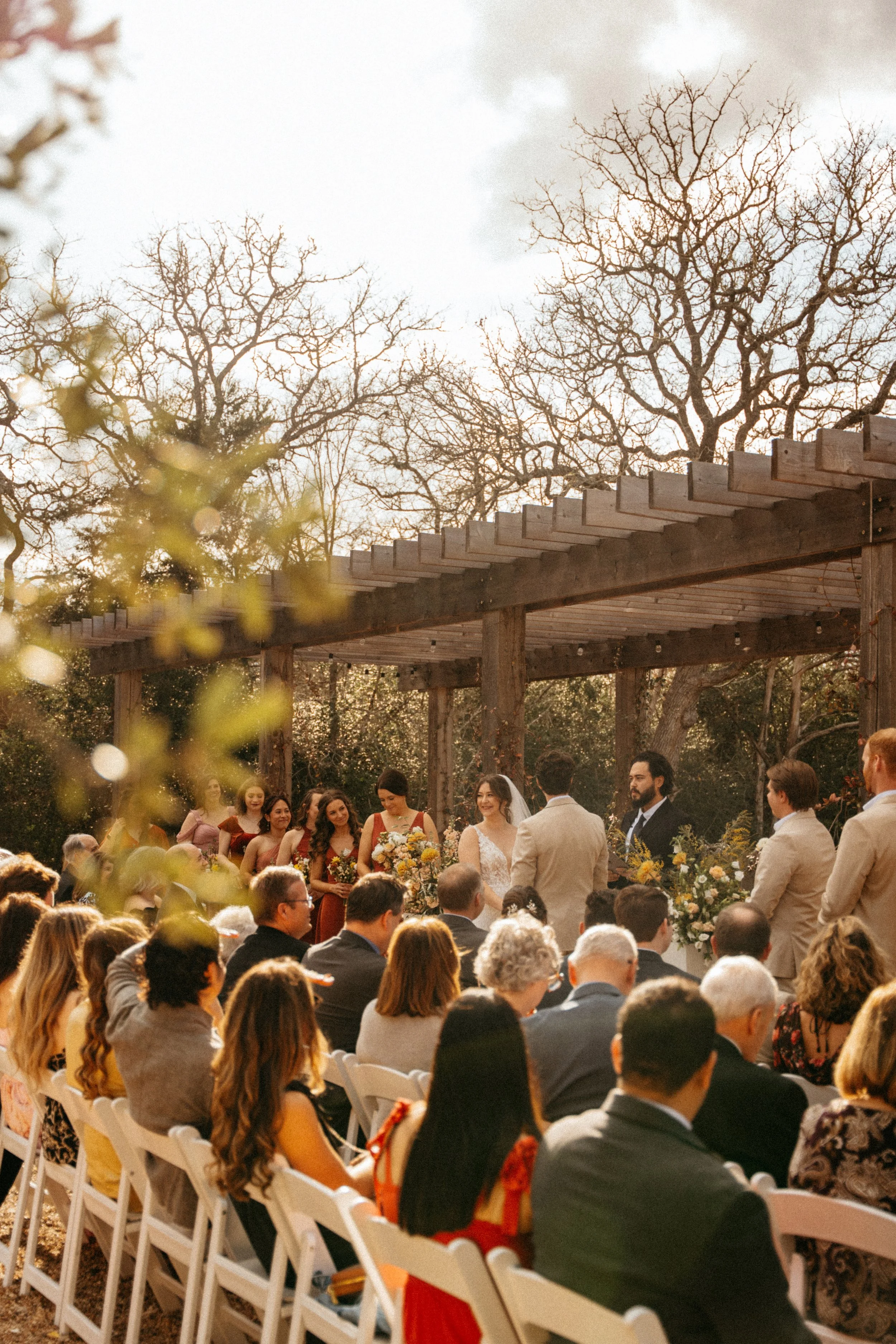 Wide view of The Grand Lady flower garden wedding ceremony in Austin
