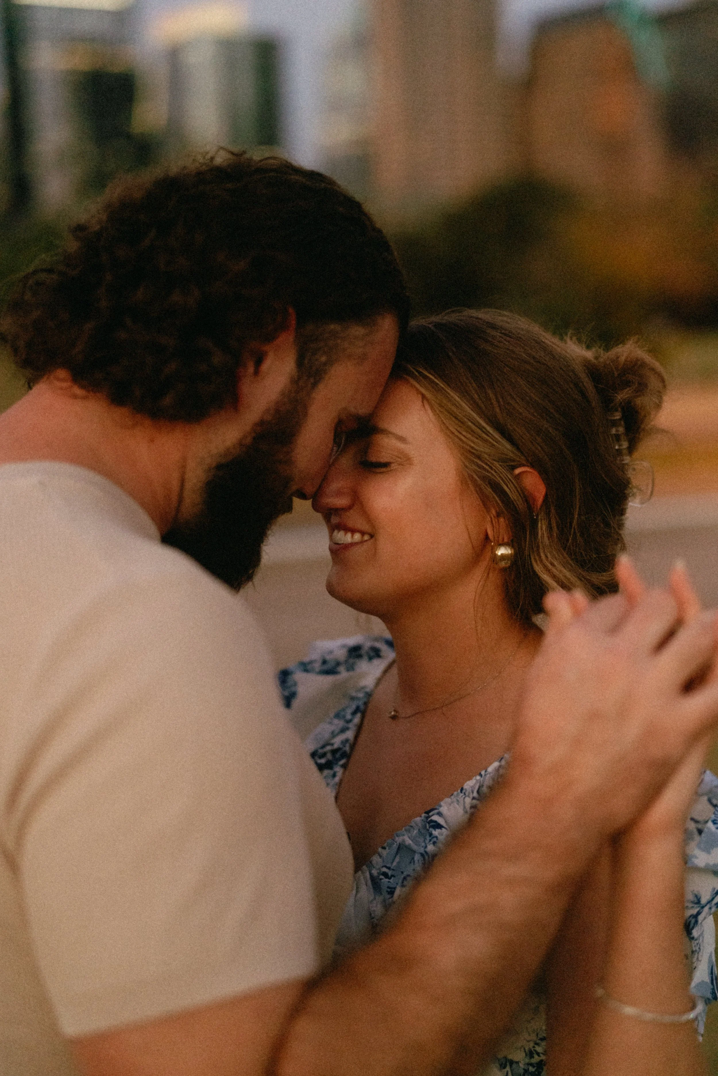 Bride-to-be surprised during proposal at Auditorium Shores with Austin skyline