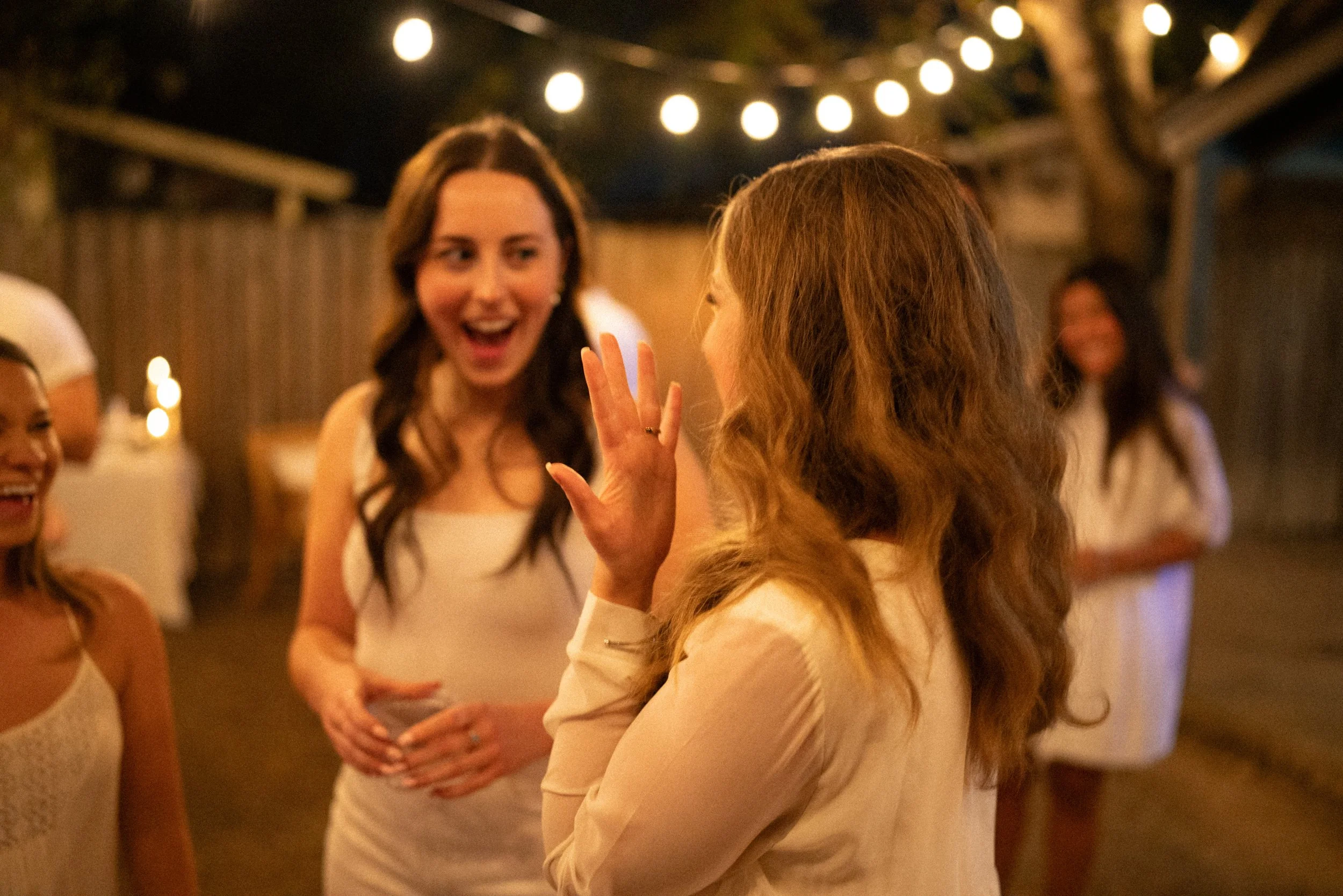 Joyful candid photos of Austin engagement celebration with friends