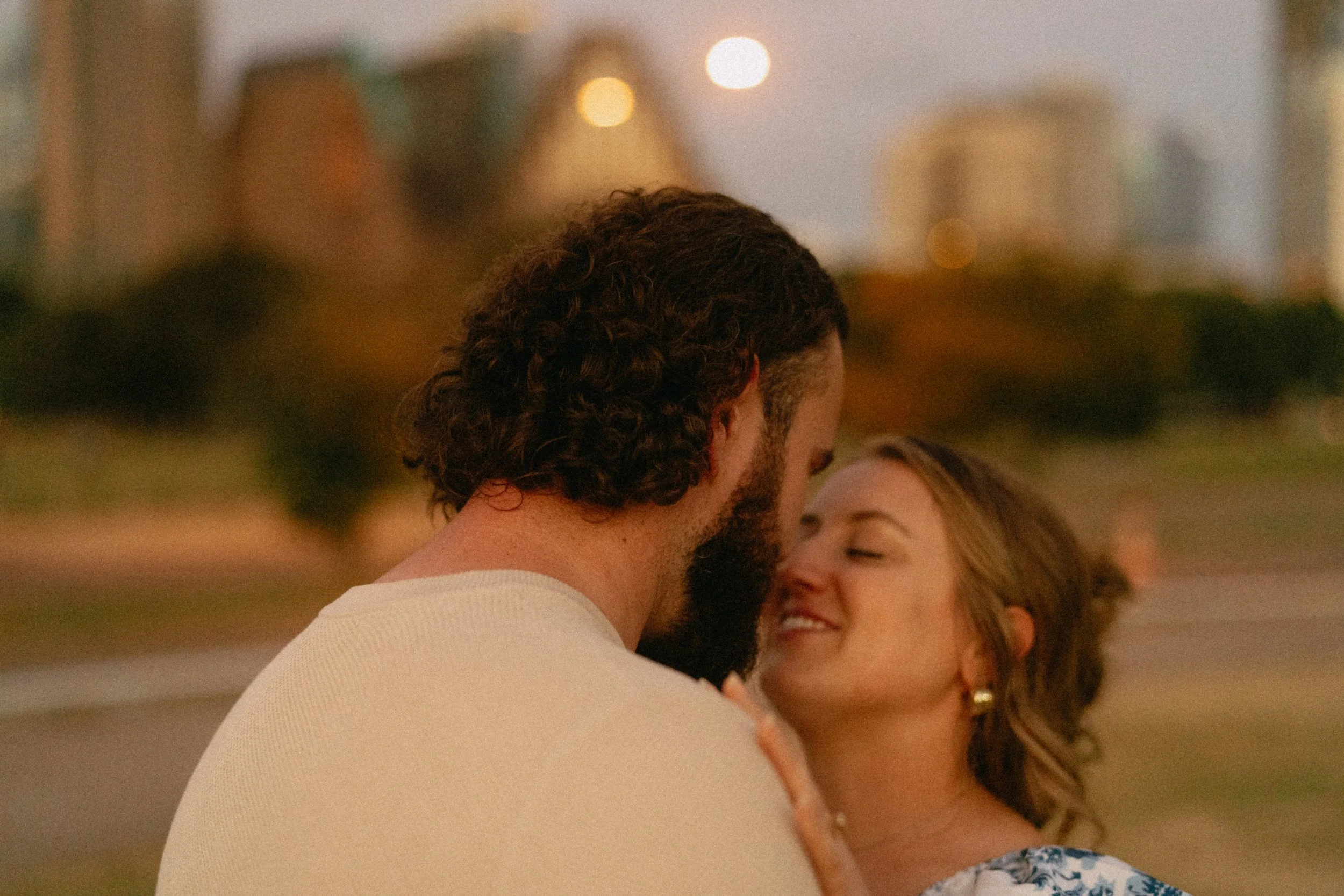 Bride-to-be surprised during proposal at Auditorium Shores with Austin skyline