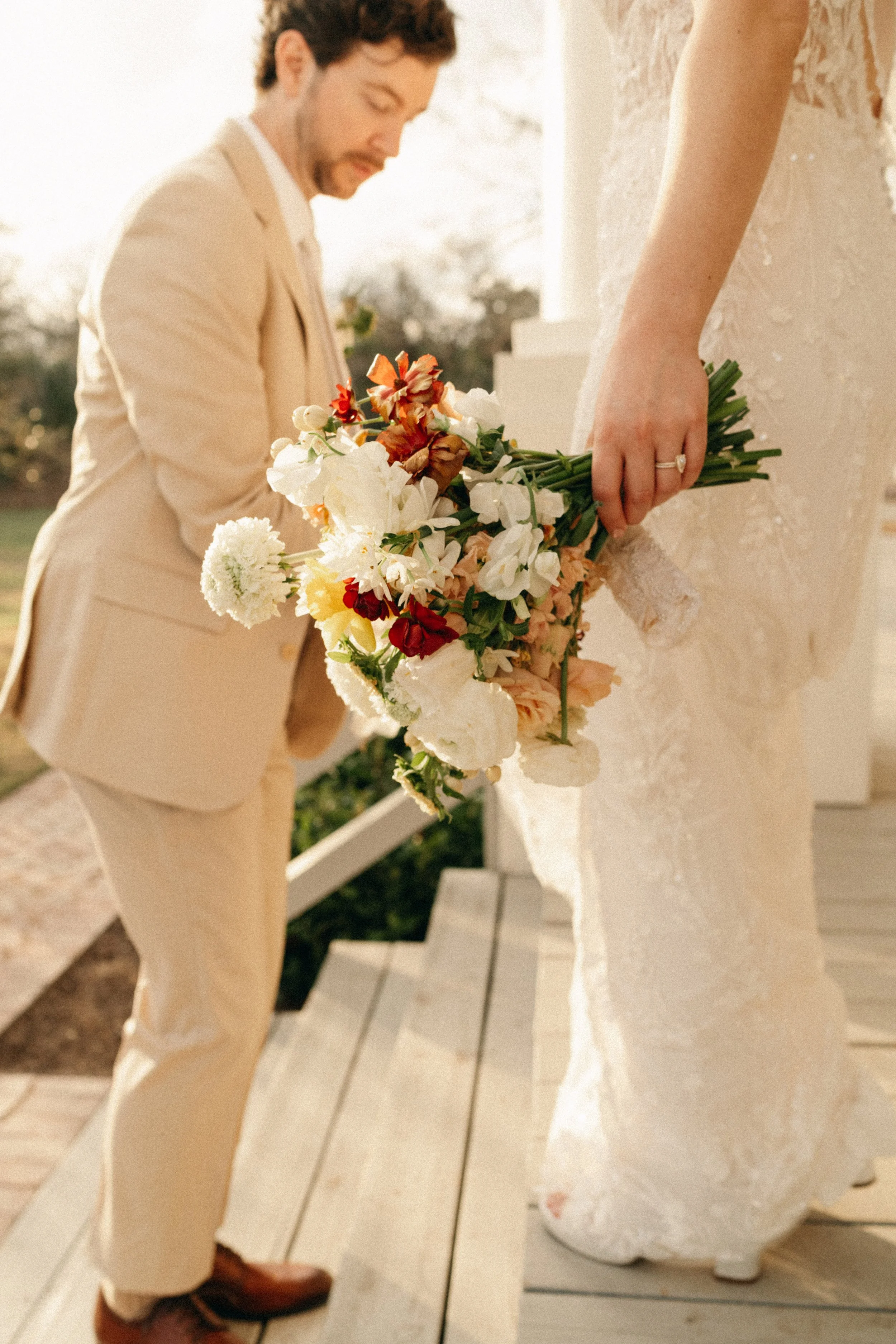 Sunset couple portrait by the mansion at The Grand Lady Austin wedding venue