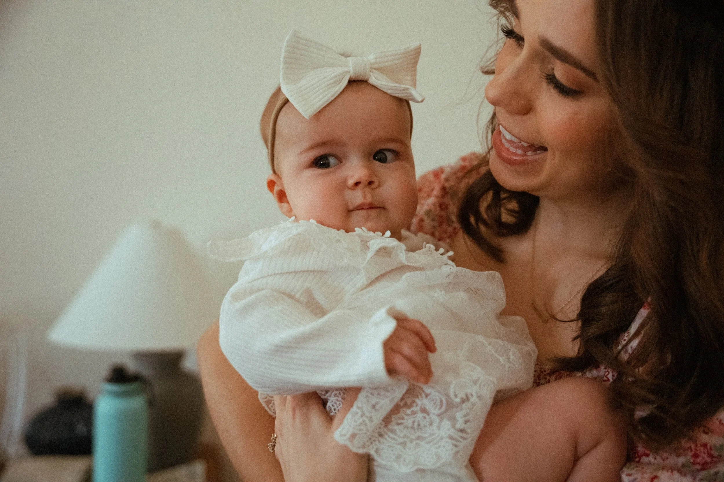 Bridesmaid with wedding baby at The Grand Lady in manor tx just outside of austin