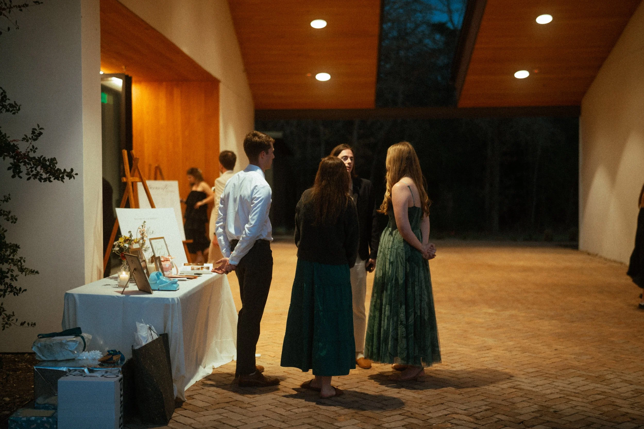 Guests enjoying cocktail hour in The Grand Lady reception courtyard