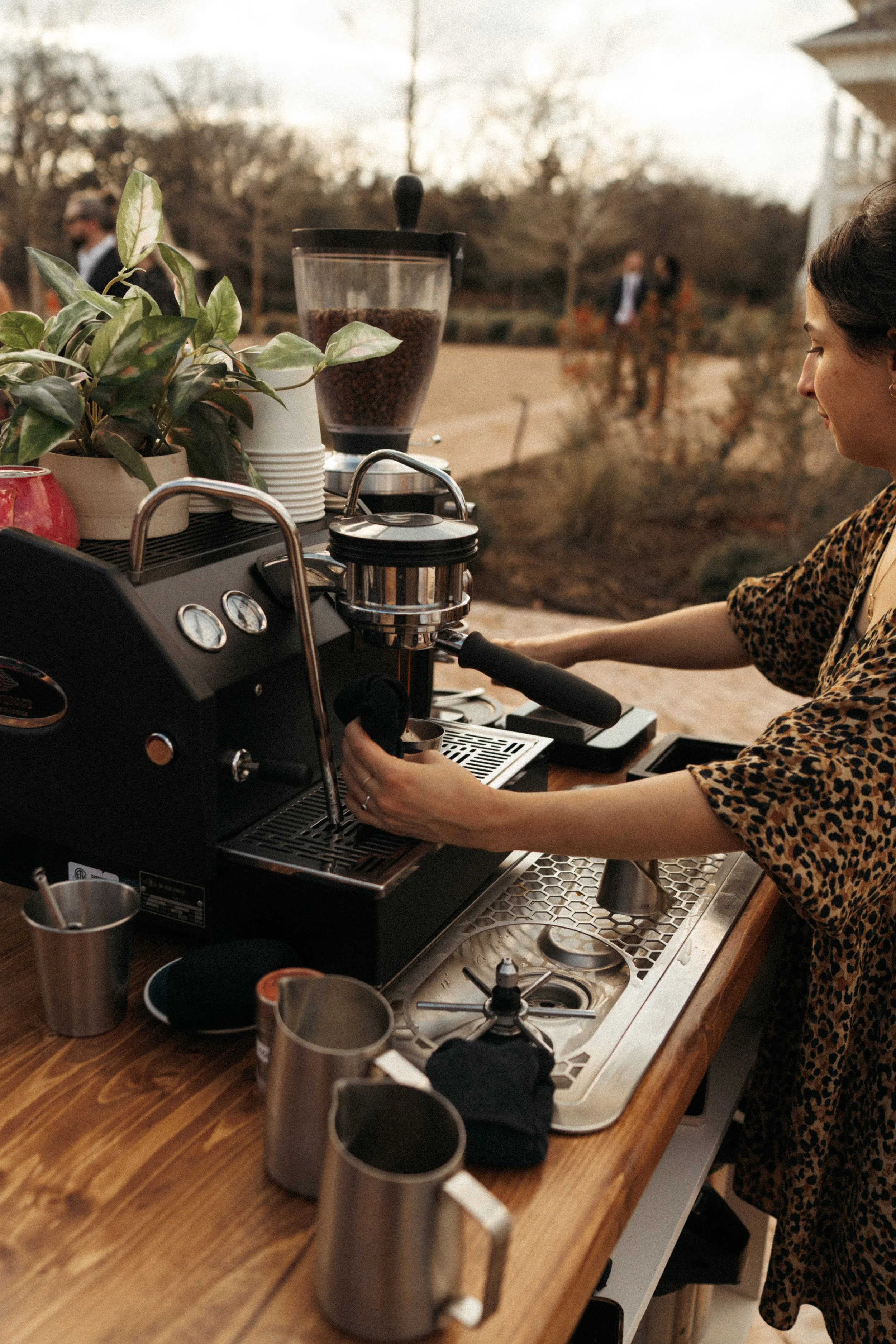 Creature coffee co serving guests in The Grand Lady reception courtyard