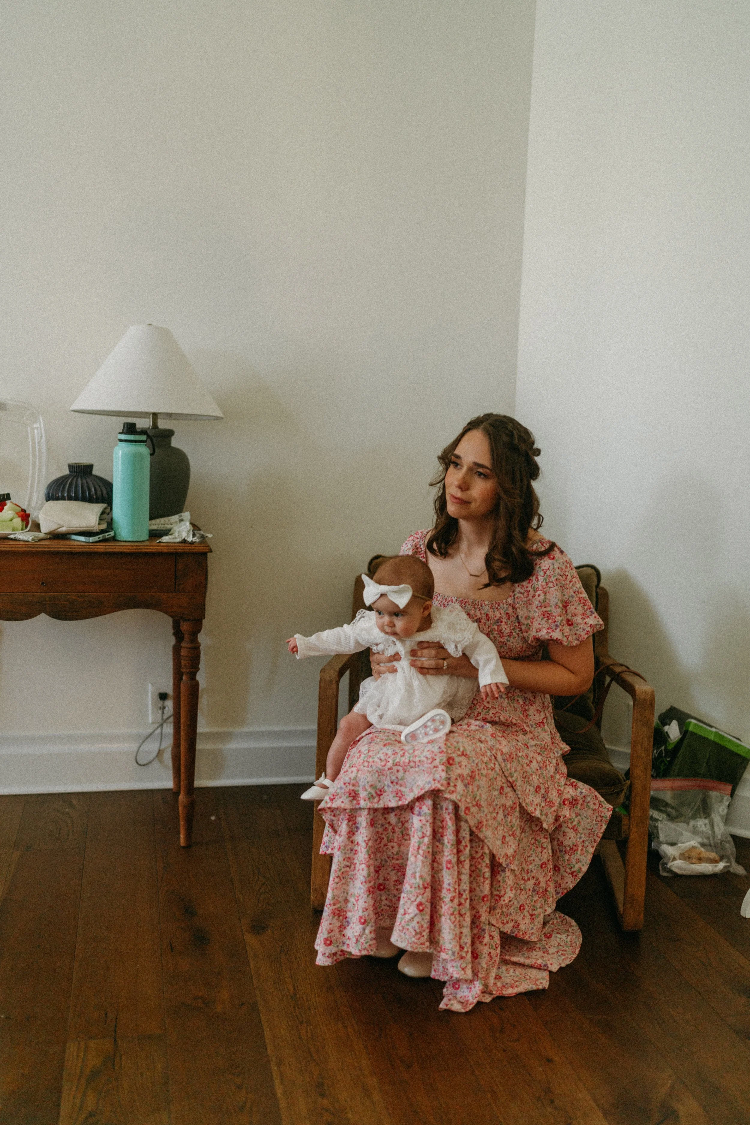 Bridesmaid with wedding baby at The Grand Lady in manor tx just outside of austin
