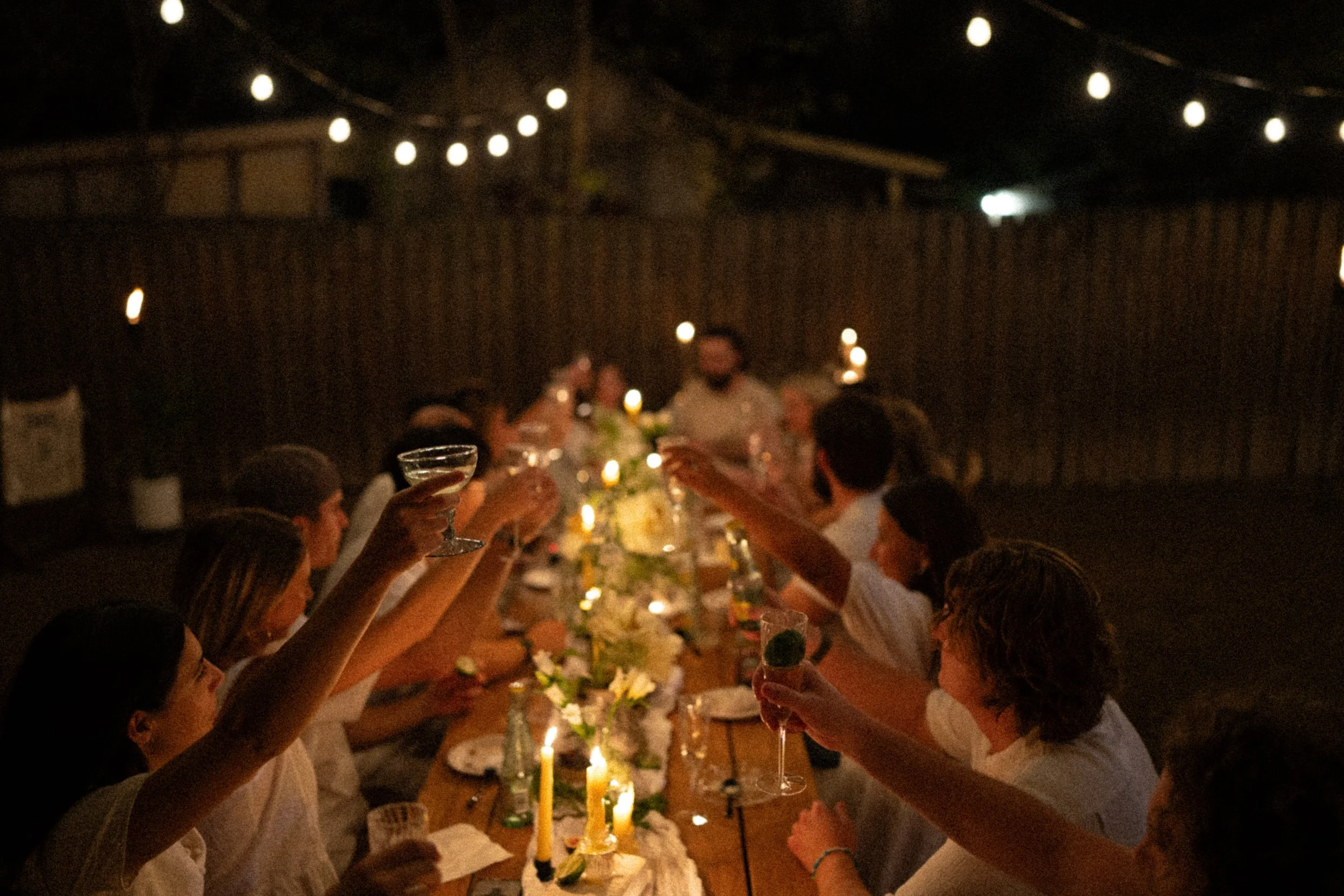 Austin wedding photographer capturing heartfelt speeches at engagement party