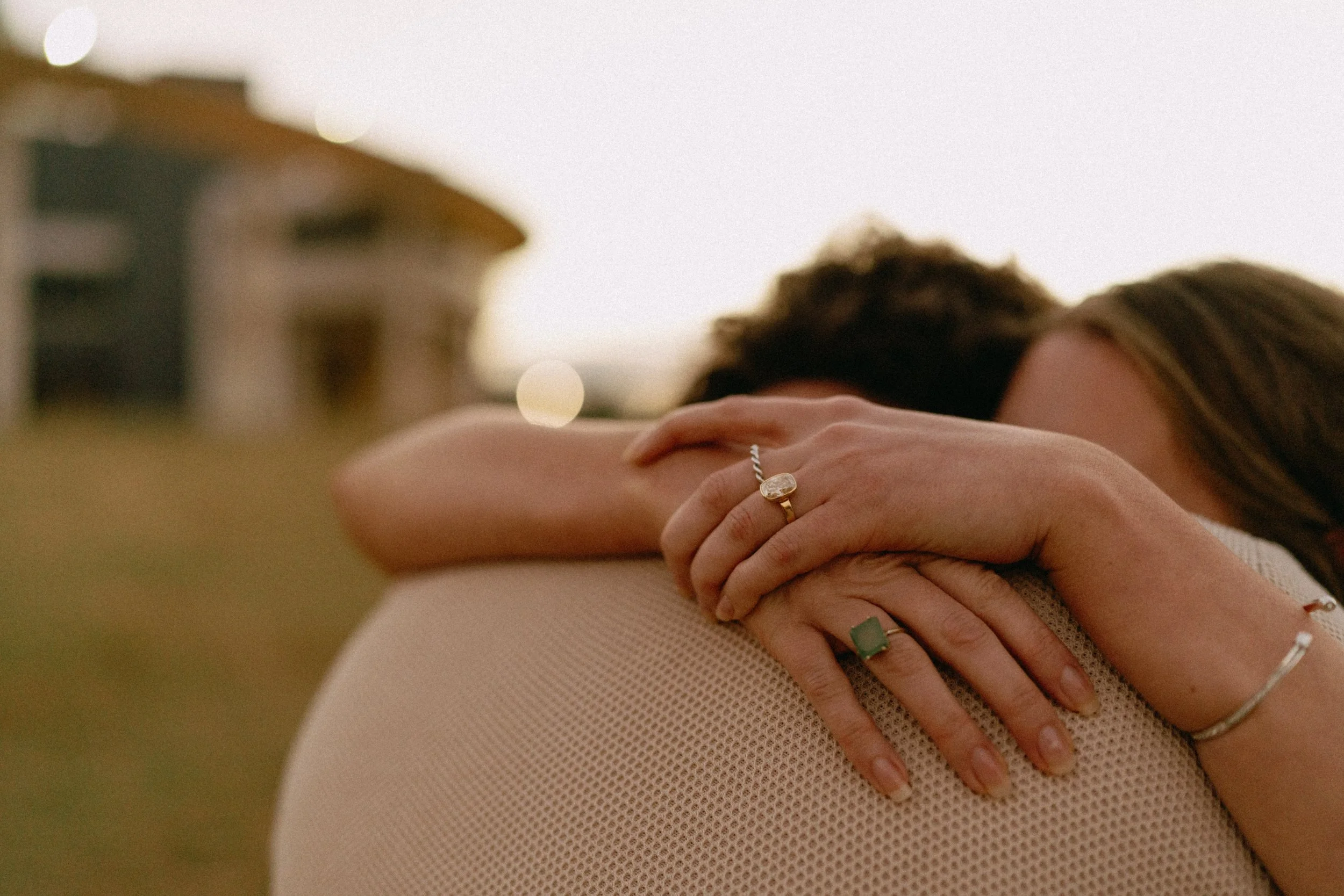 Bride-to-be surprised during proposal at Auditorium Shores with Austin skyline