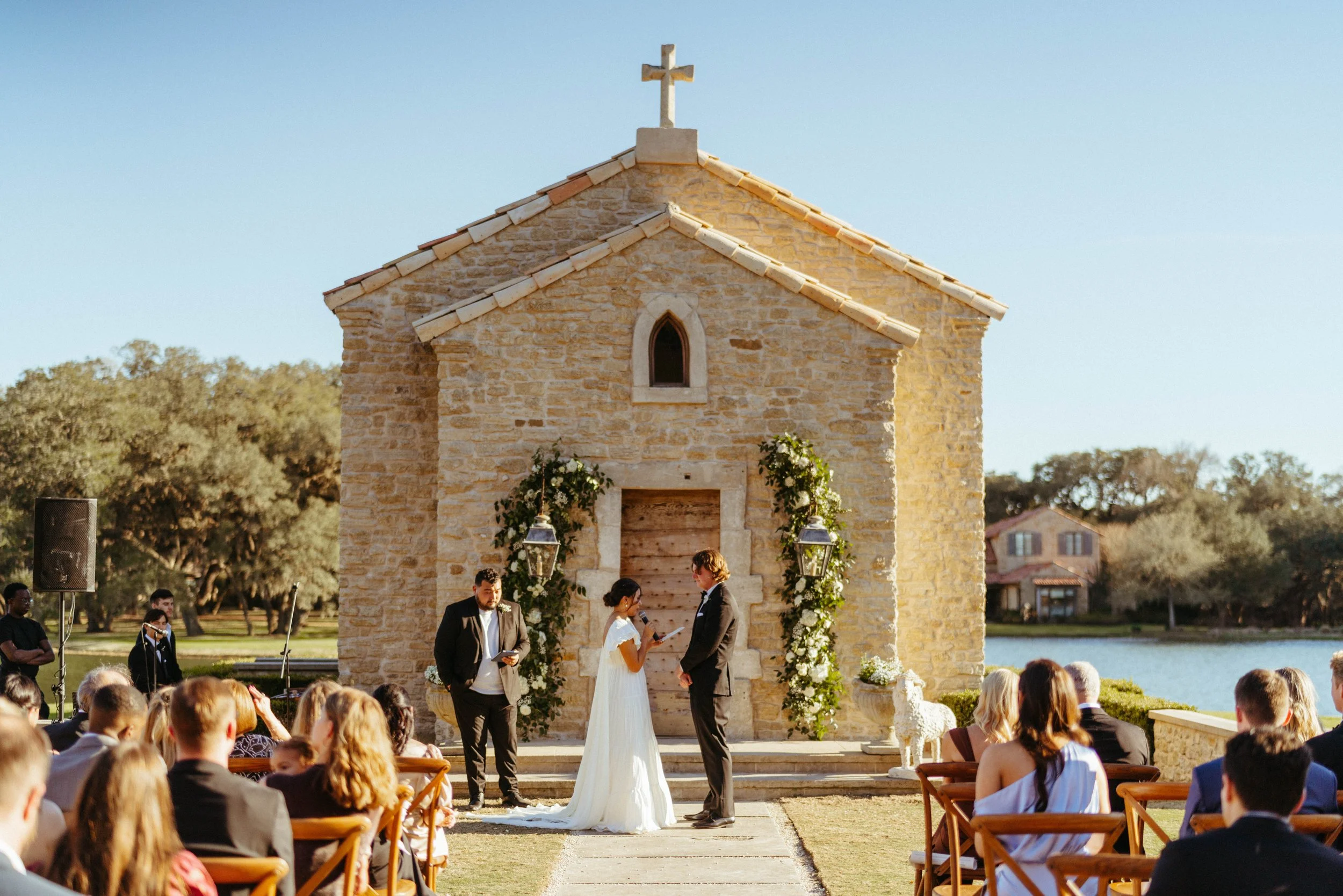 Wedding vows exchanged at the French chapel | Austin travel wedding photographer captures emotional ceremony.