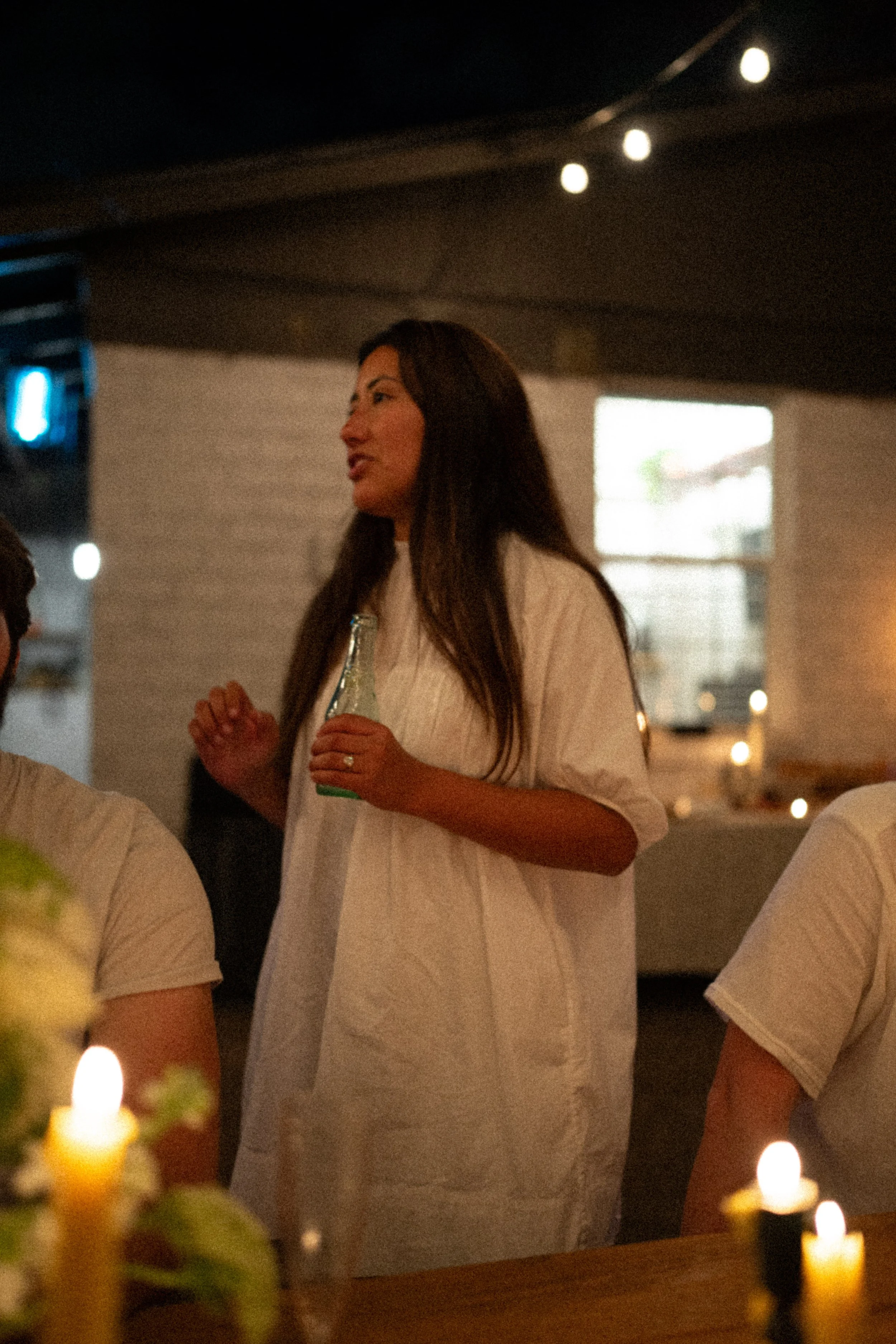 Austin wedding photographer capturing heartfelt speeches at engagement party