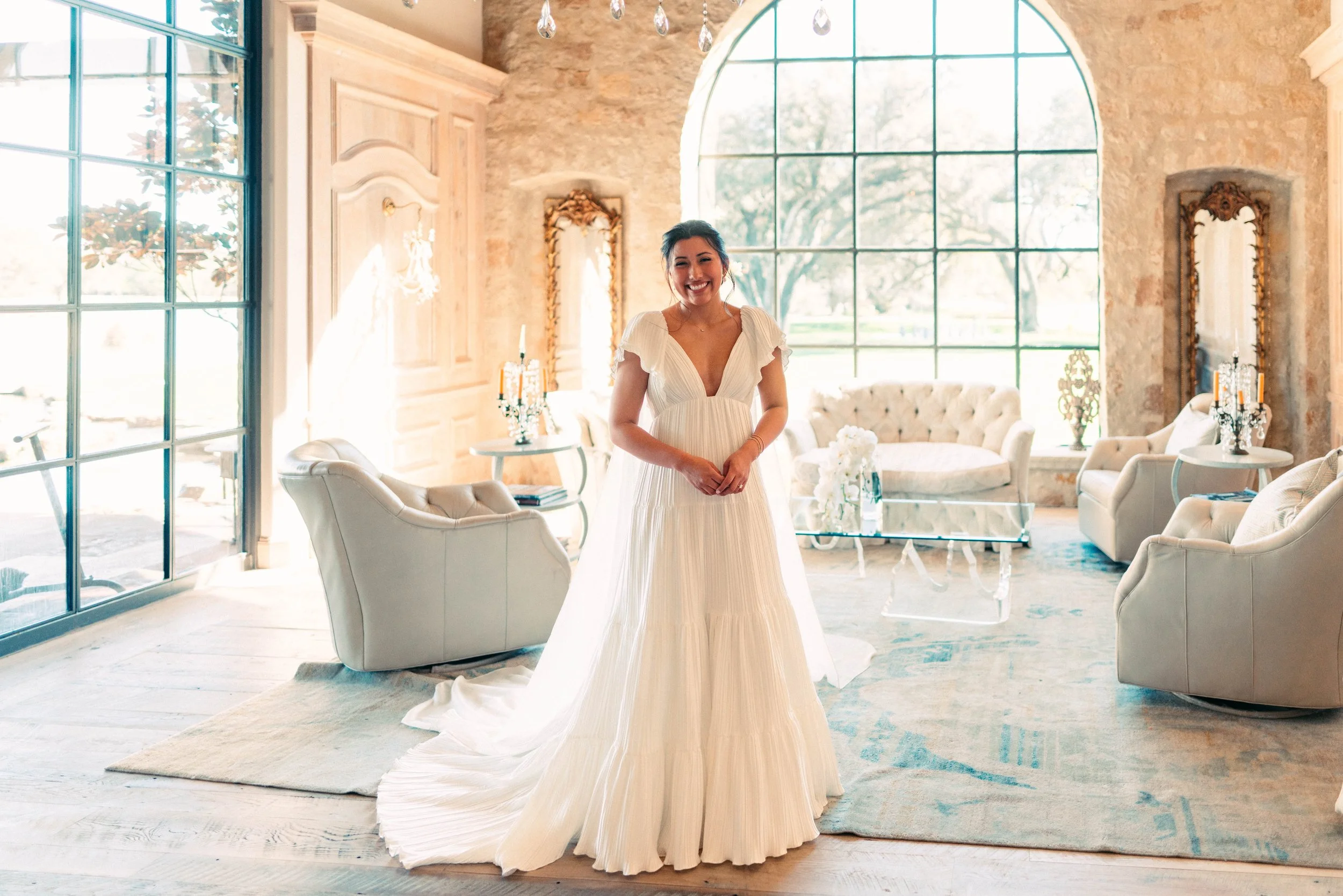 Bride sharing an emotional first look with her bridesmaids at Houston Oaks | documentary Austin travel wedding photographer.