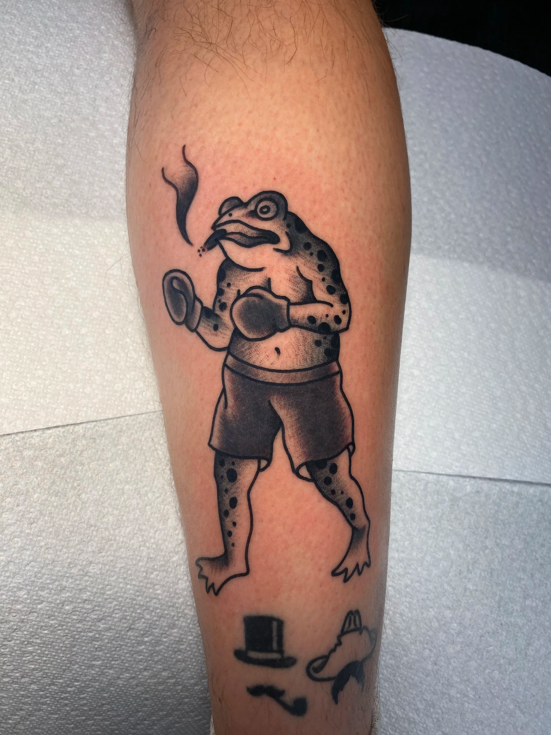 American Traditional Black Frog Tattoo by Jordan Brill in Nashville, TN