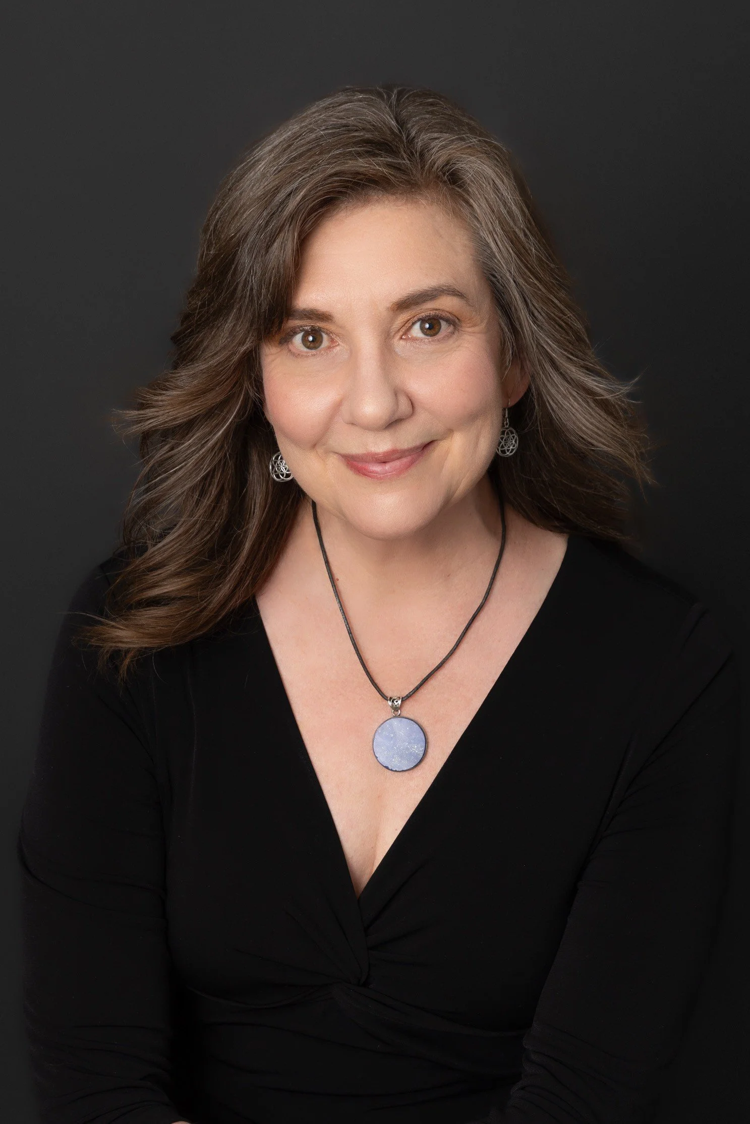 Headshot of poet Laura Van Prooyen