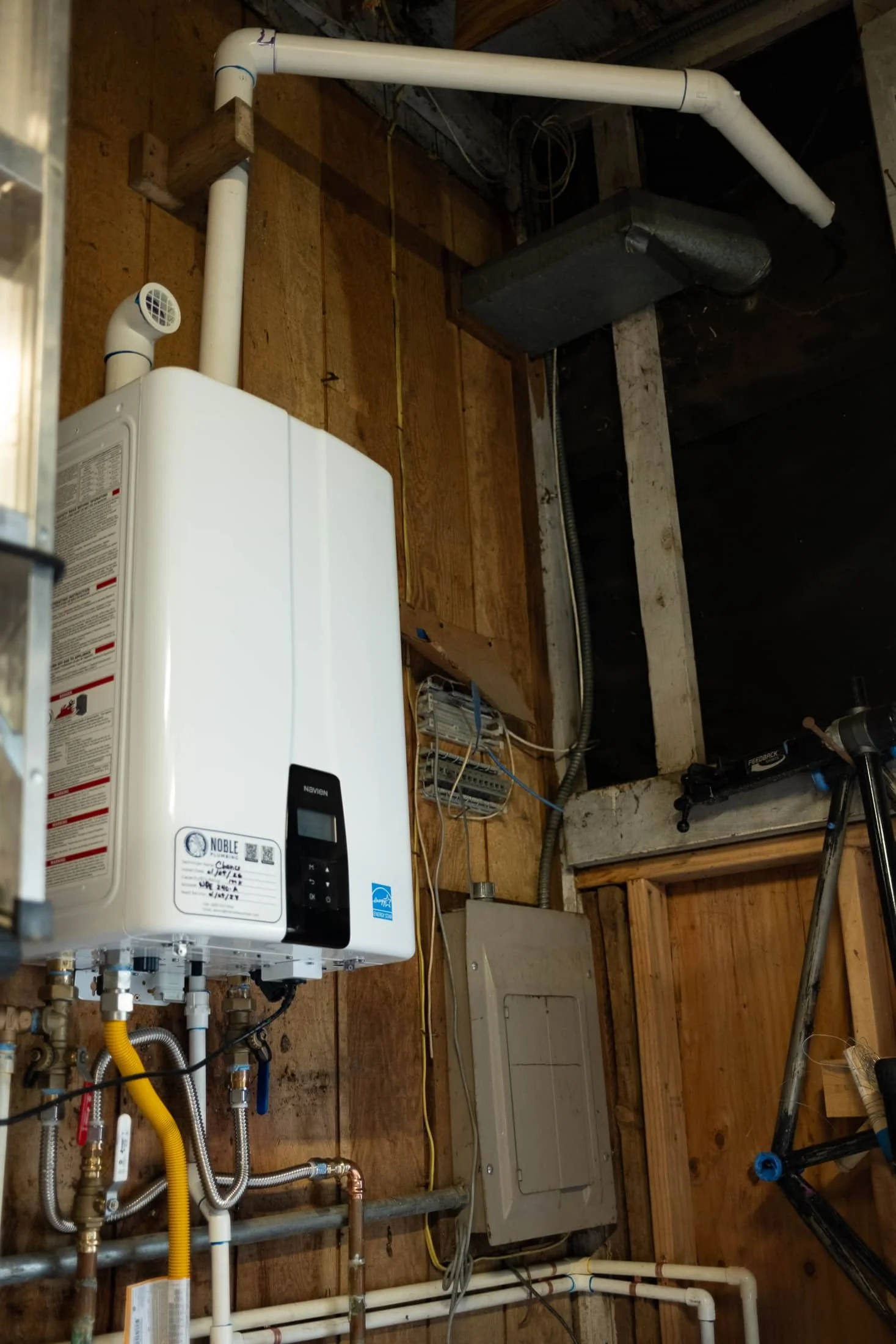 Newly installed tankless water heater by Noble Plumbing for local Snoqualmie family.