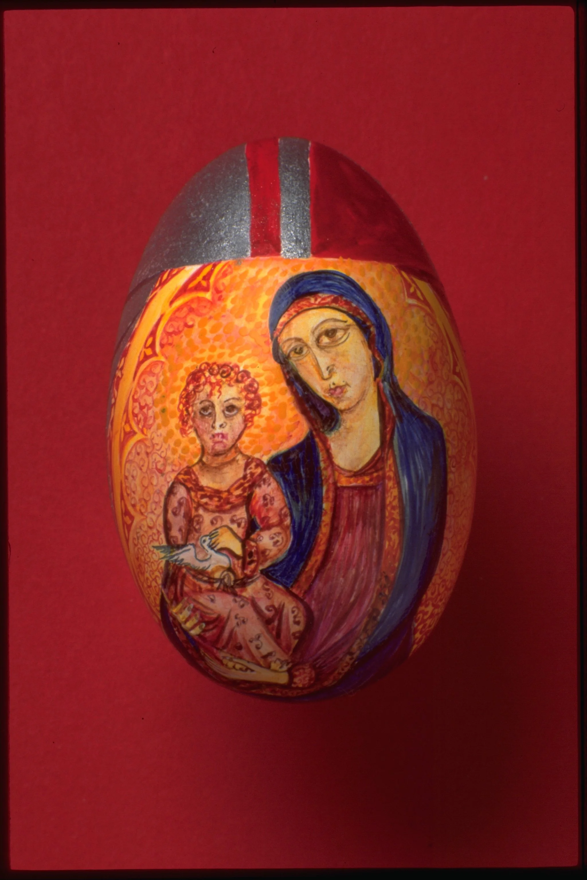 MADONNA - Lathed wood/Pigment - Hen sized egg - This piece is in the Museo della Contrada del Bruco in Siena, Italy.