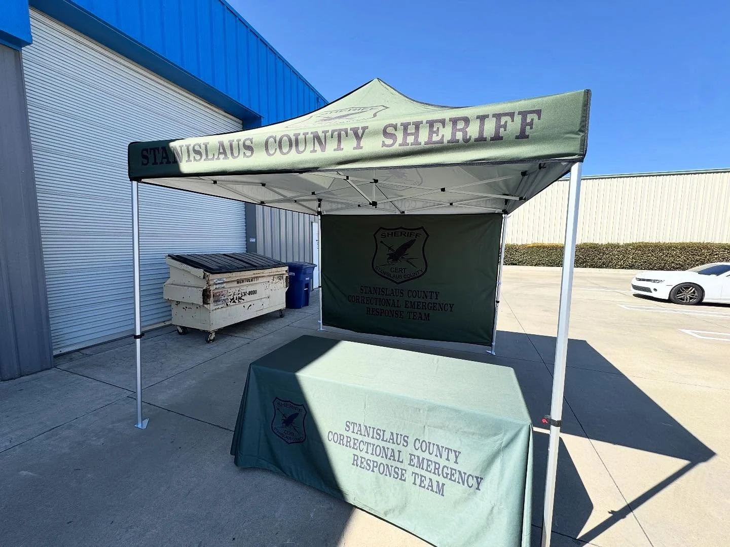 We offer tents in 10x10, 10x15 and 10x20 now.  Backdrops, sides and table draped.