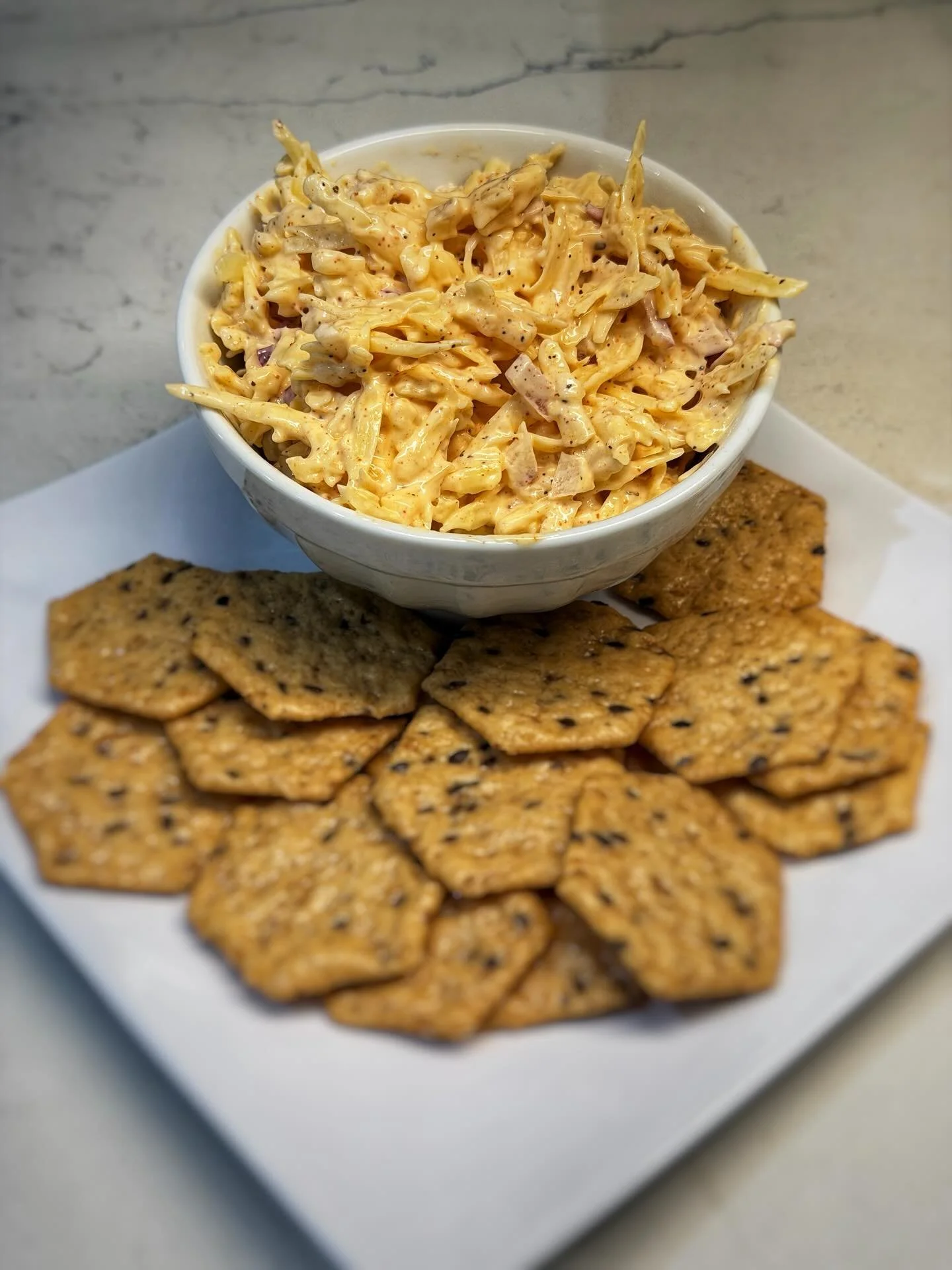 Jarlsburg Cheese Dip

0.5 lbs Jarlsburg cheese (shredded)
1/4 C Red Onion (diced)
1/2 of a lemon
3/4 C of Mayo
1 tsp Everything But The Meat Seasoning 

#gameday #nfl #colts