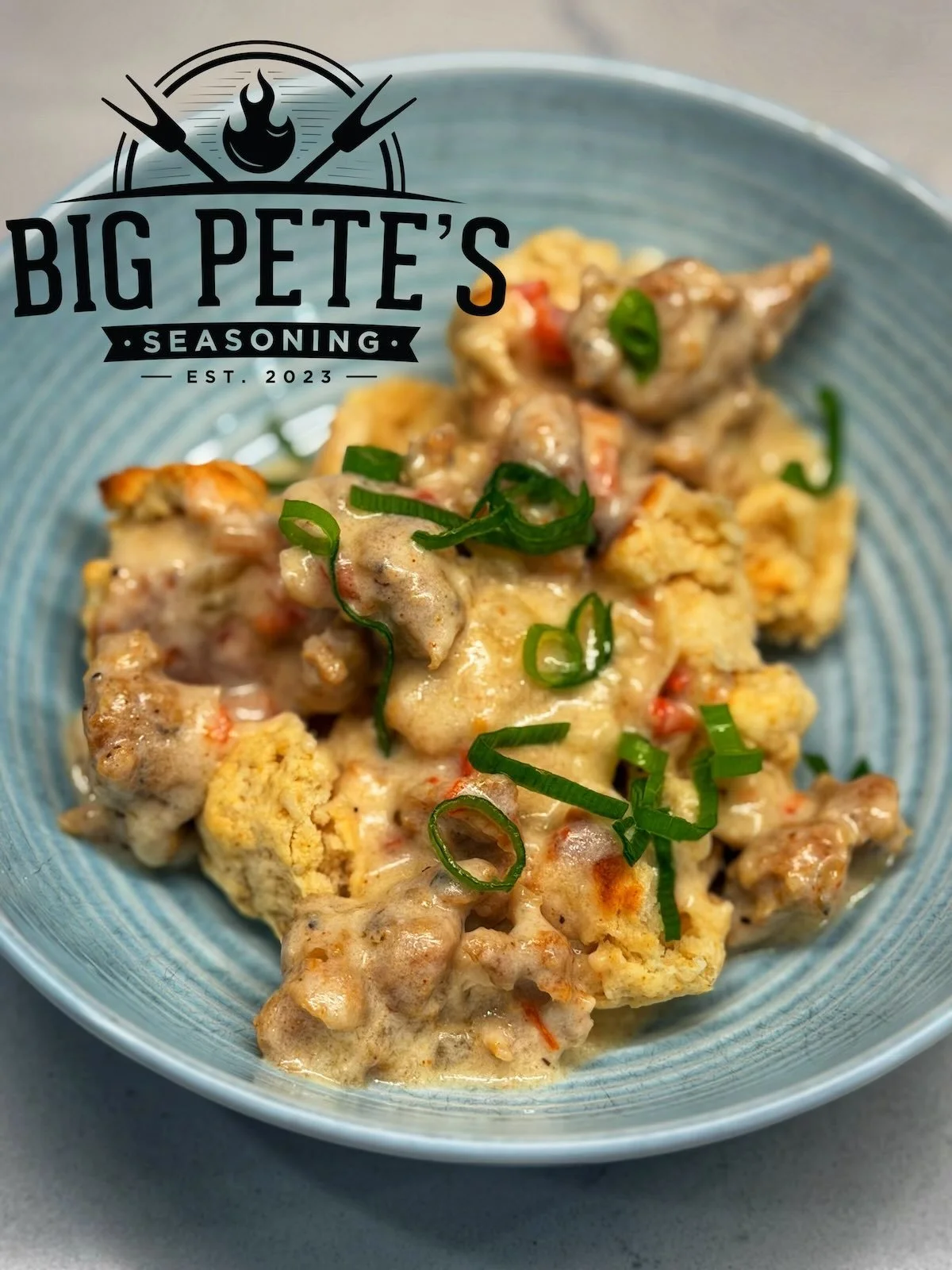 Sausage gravy over homemade biscuits.  Biscuits and gravy seasoned with Everything But The Meat.
#breakfast #bigpetesseasonings #sausage