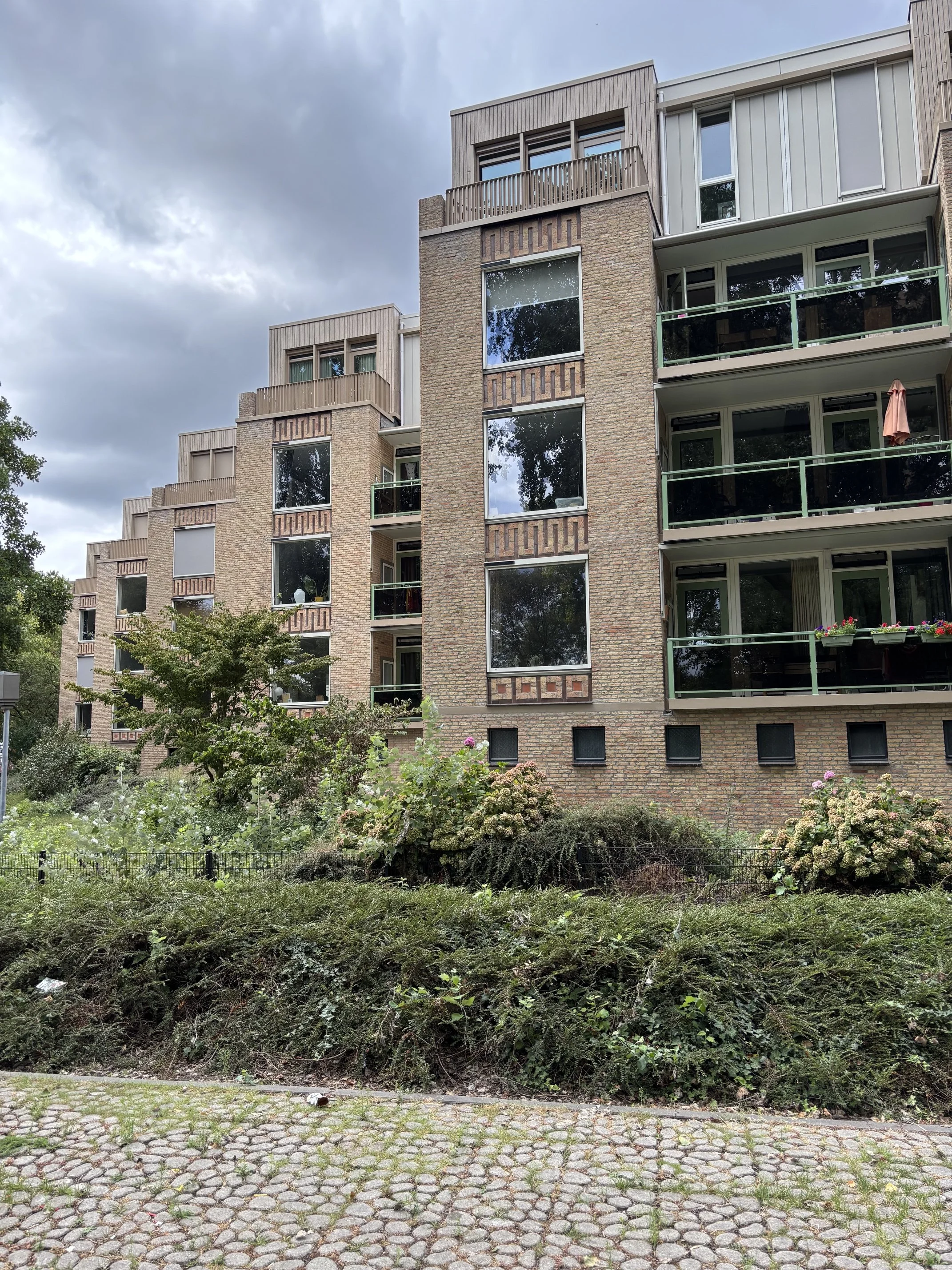 Renovatie en optopping van de Grijpmaflats aan de Rondweg 