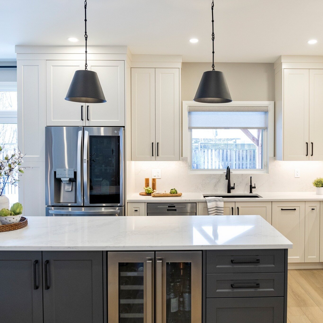 Swipe to see the after, before and during of our #ProjectEastbridge kitchen gut and renovation. We had the pleasure of designing this open concept kitchen and living room space for an incredible family in Waterloo. We couldn't be happier with the fin
