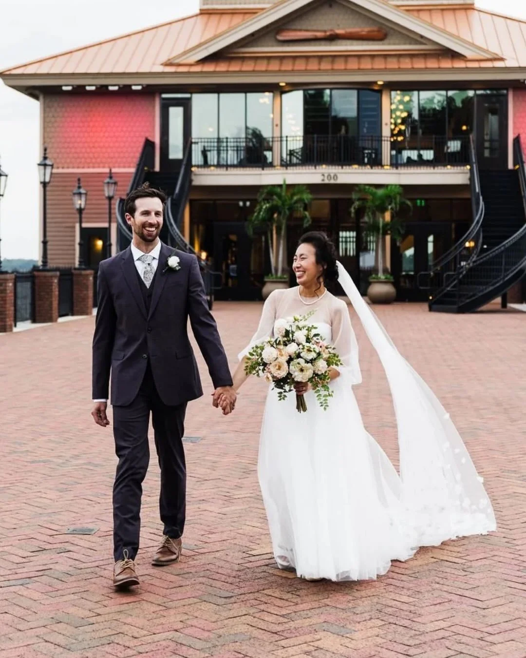 Lily and Ryan&rsquo;s wedding day at @tavarespaviliononthelake was bright, classic, and full of thoughtful touches that celebrated their faith and Lily&rsquo;s Taiwanese heritage. They spent the morning getting ready with their people close by, then 