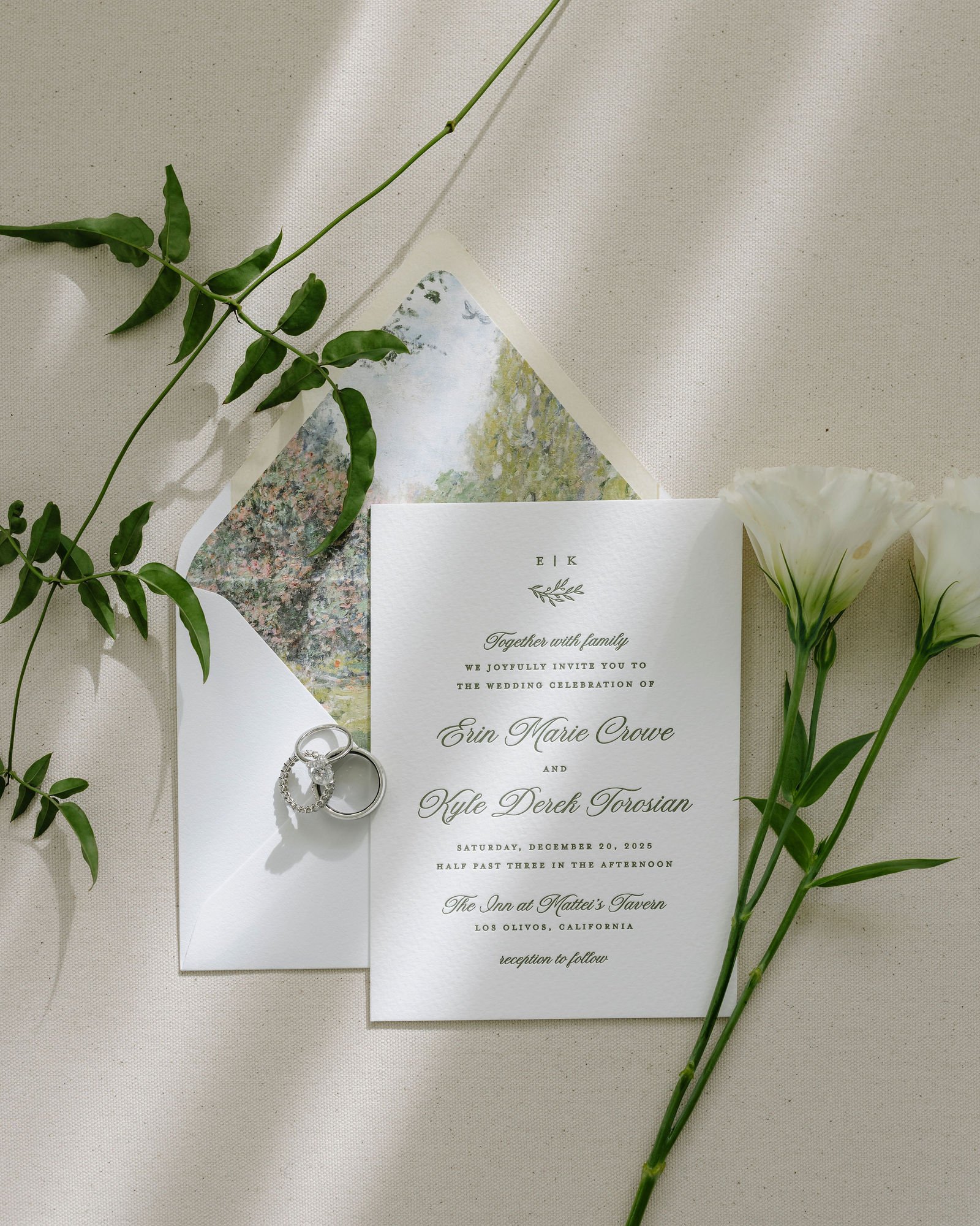 Elegant wedding invitation suite with greenery photographed by a hybrid film and digital wedding photographer for an Inn at Mattei's Tavern Wedding Day.