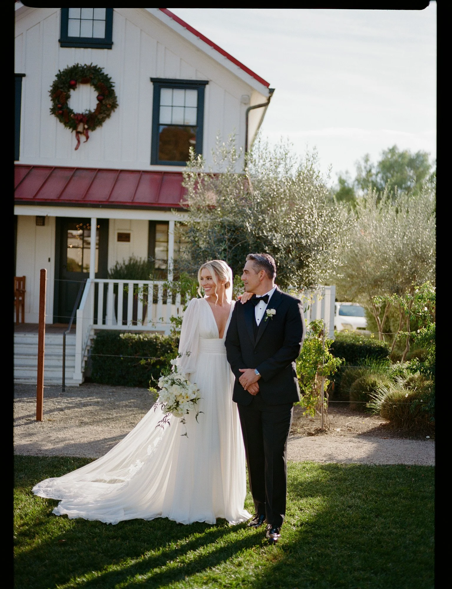 Bride and groom portrait outside a refined California wedding venue, captured on medium format film at the Inn at Mattei's Tavern Wedding.