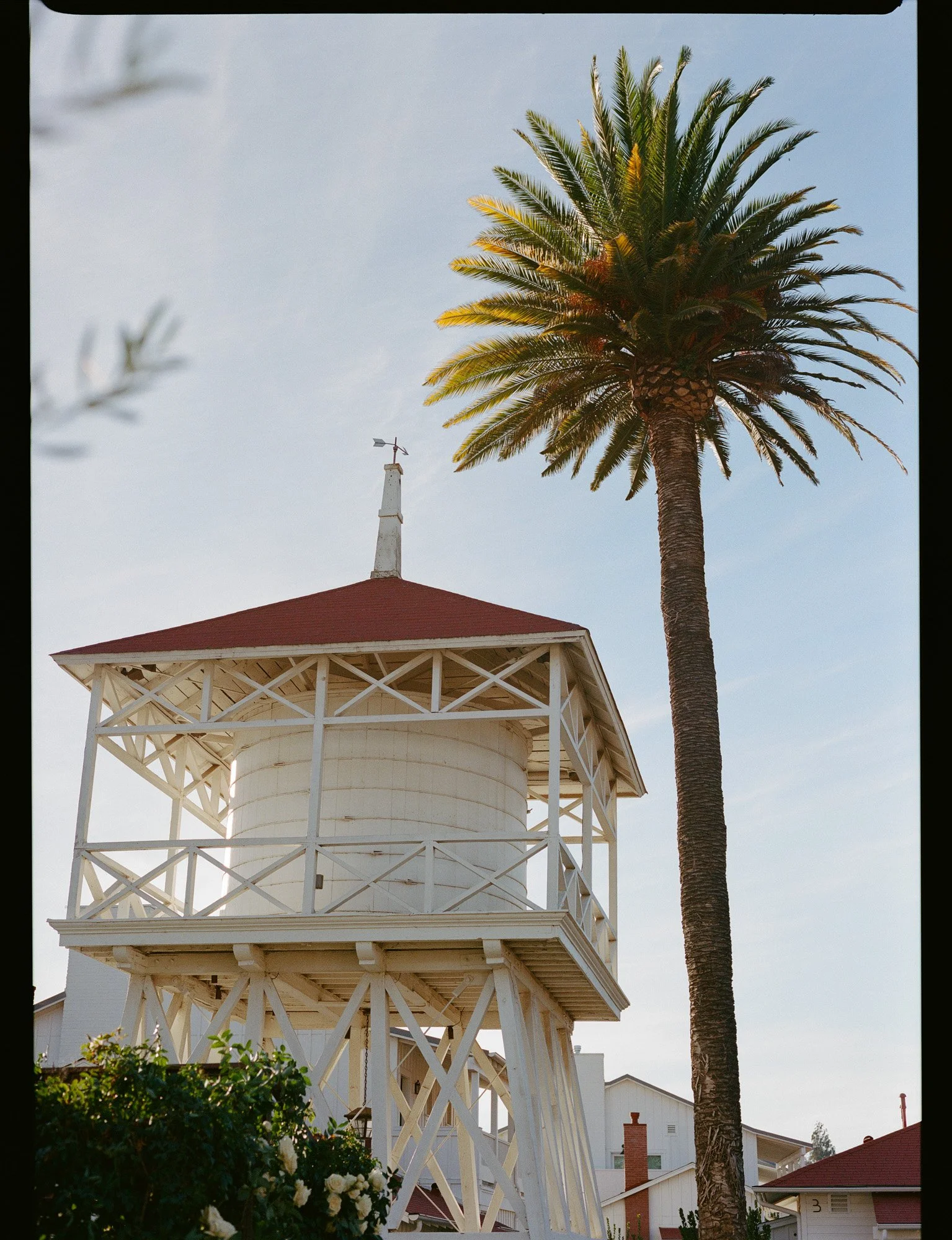 Historic water tower and palm tree at a Santa Barbara or Santa Ynez wedding venue, the Inn at Mattei's Tavern in Los Olivos