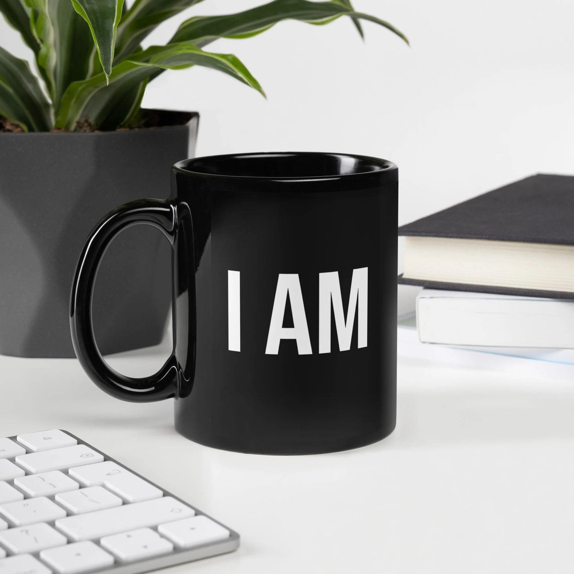black-glossy-mug-black-11-oz-handle-on-left-65b90d6d3ccae.jpg