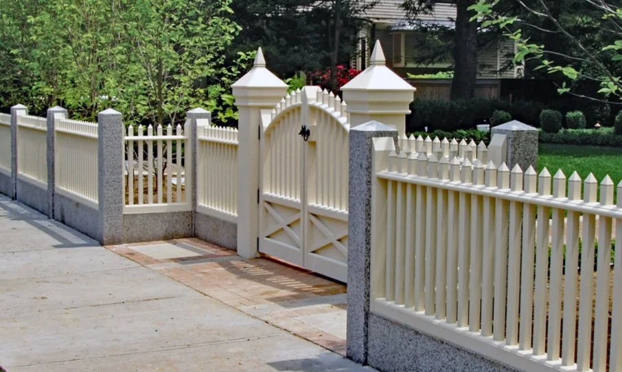 Cellular Vinyl Entry Gate G-8:

Preserving antiquity in Cellular Vinyl is a hallmark for Perfection Fence. Every detail was included in this Cambridge restoration project. The grand entrance gate and fence have been replaced in a forever material, th