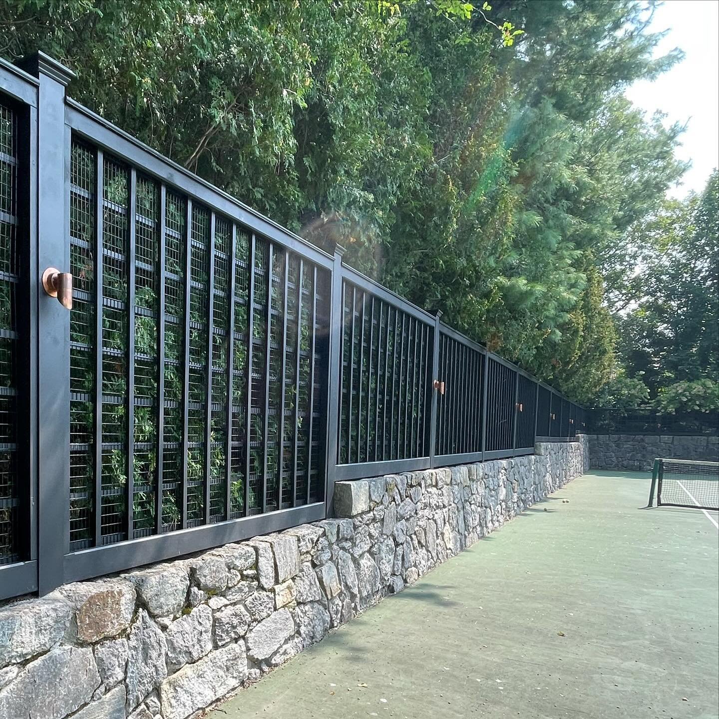 When you want your tennis enclosure to make a statement! This custom lattice fence with mesh infill does the job, not only keeping the balls in but adding that elegant flare. #perfectionfence #fence #fences #fencedesign #fencesofinstagram #tenniscour