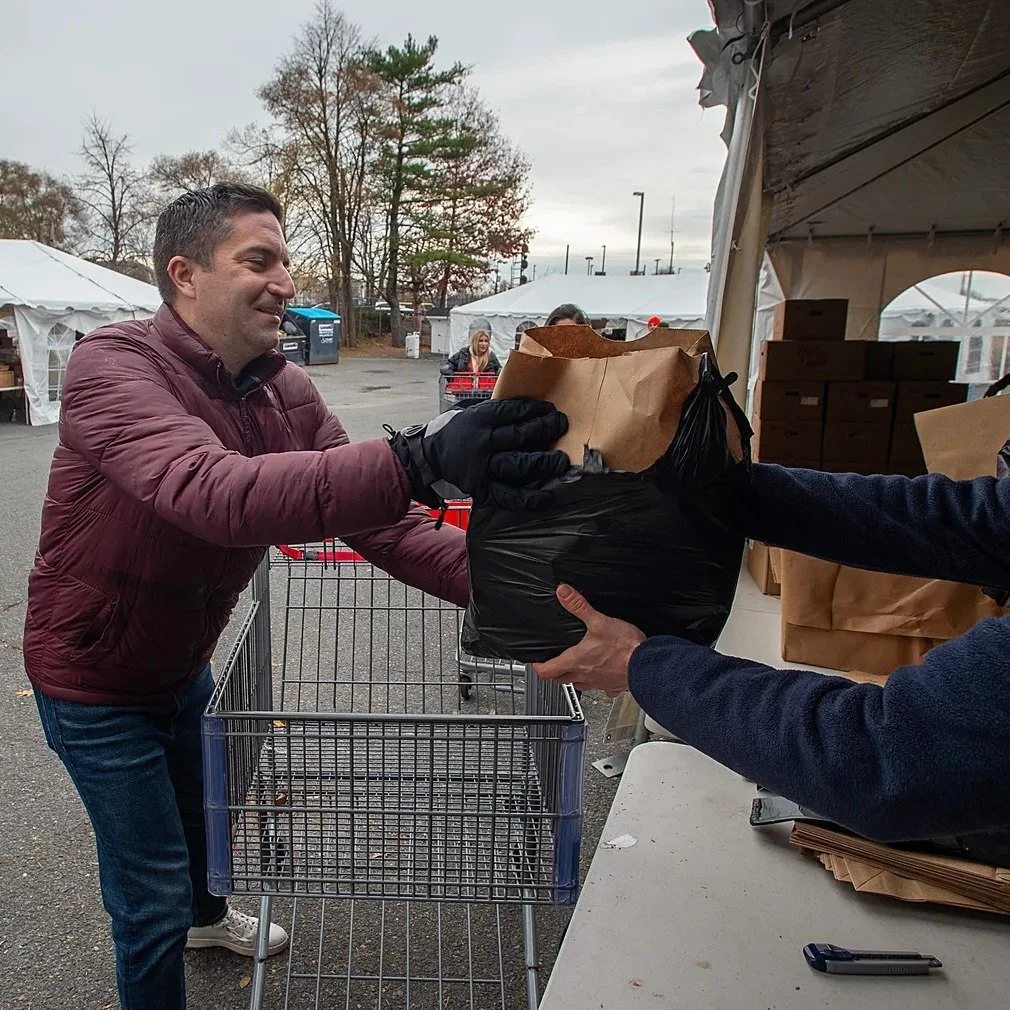 It was great to join Rep. Sousa and so many community volunteers at last week's annual pre-Thanksgiving food distribution with @uwoftc!

Photo Credit (first picture): Daily News And Wicked Local Staff Photo/Art Illman