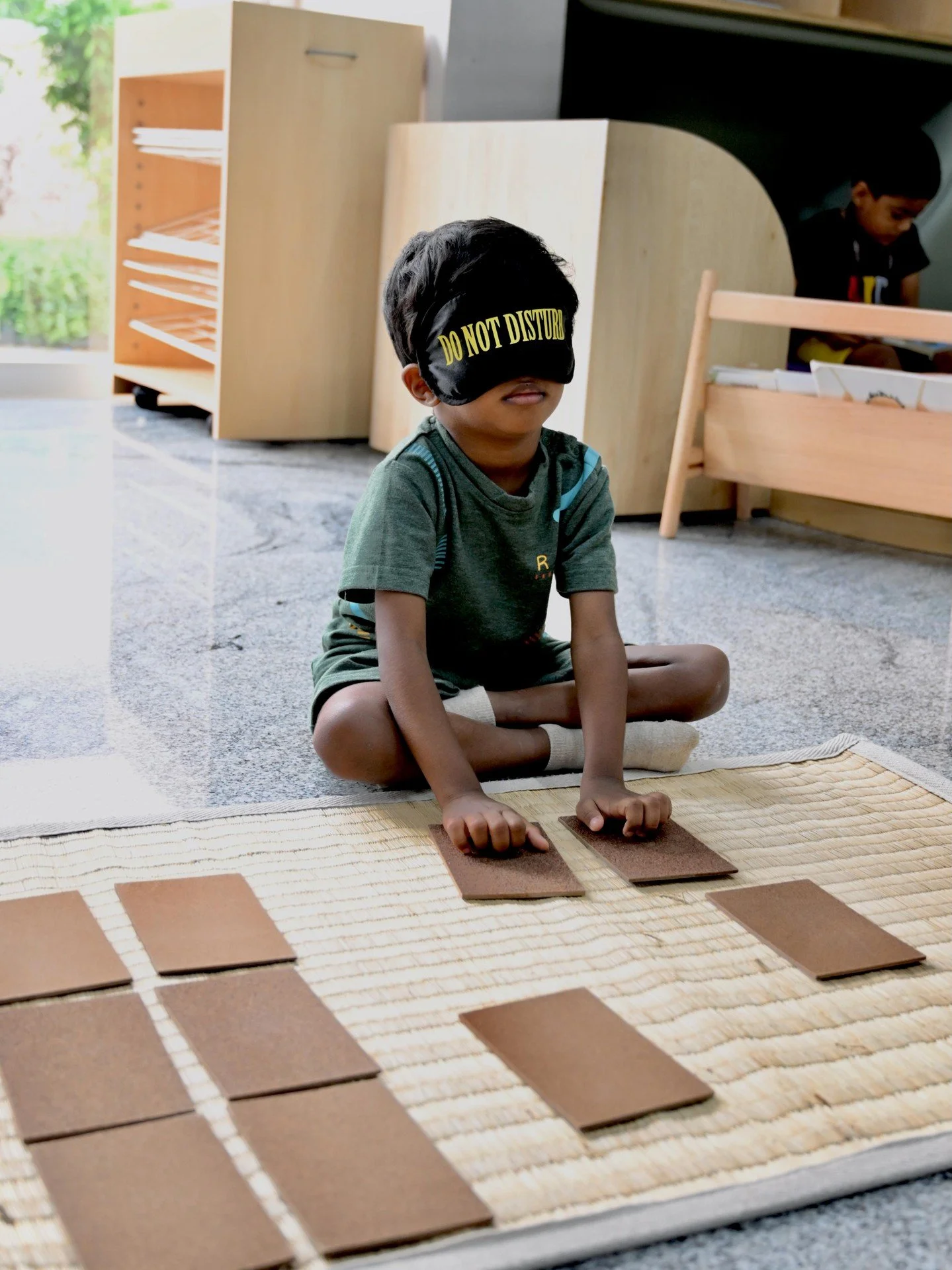 In the gentle rhythm of the work cycle, our Ruh’lers move through their environment with purpose and curiosity. They are drawn to meaningful materials that invite exploration, encouraging them to refine their focus, develop coordination, and st