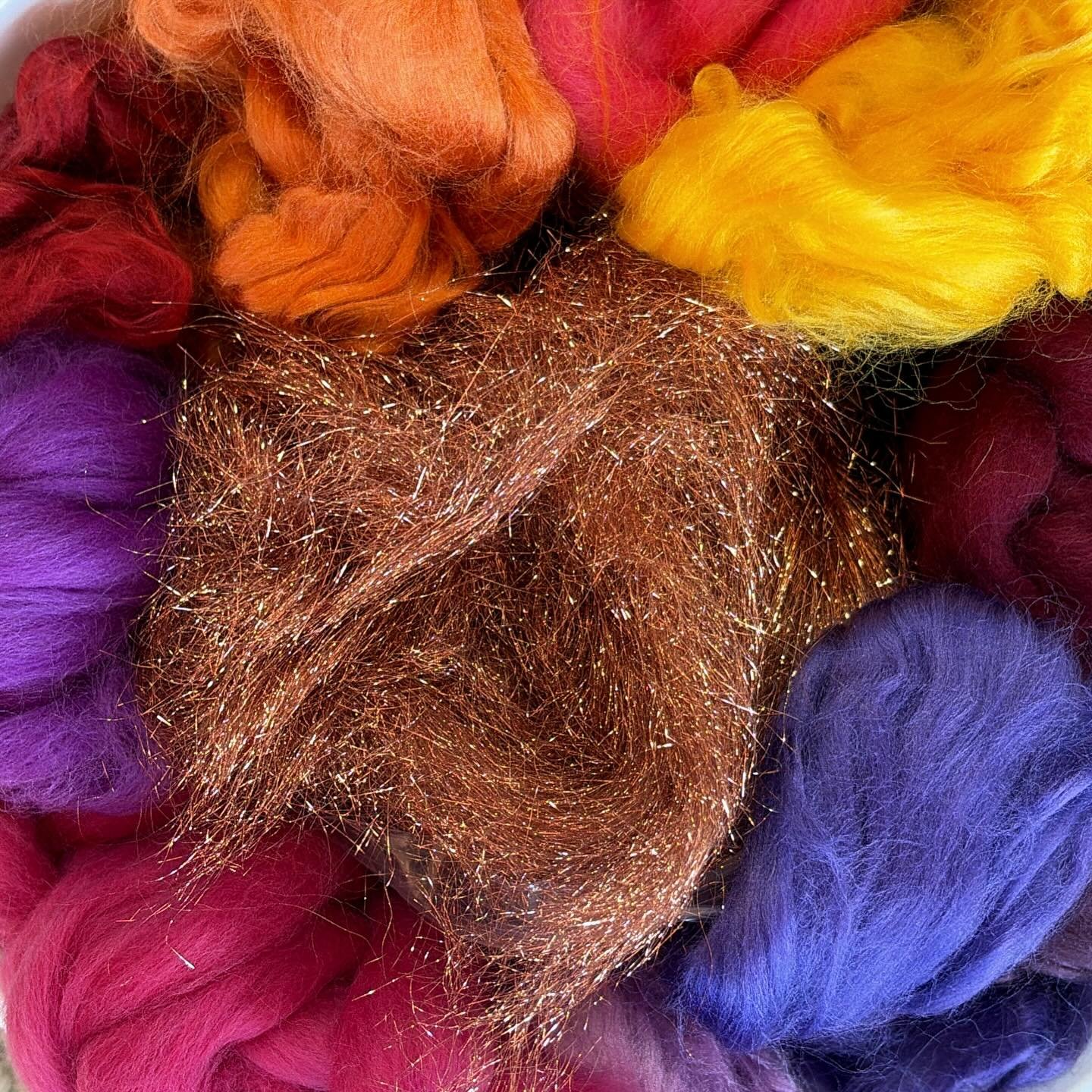 Assembling art batt ingredients for a new piece worthy of a silent auction. #wearableart #wetfelting