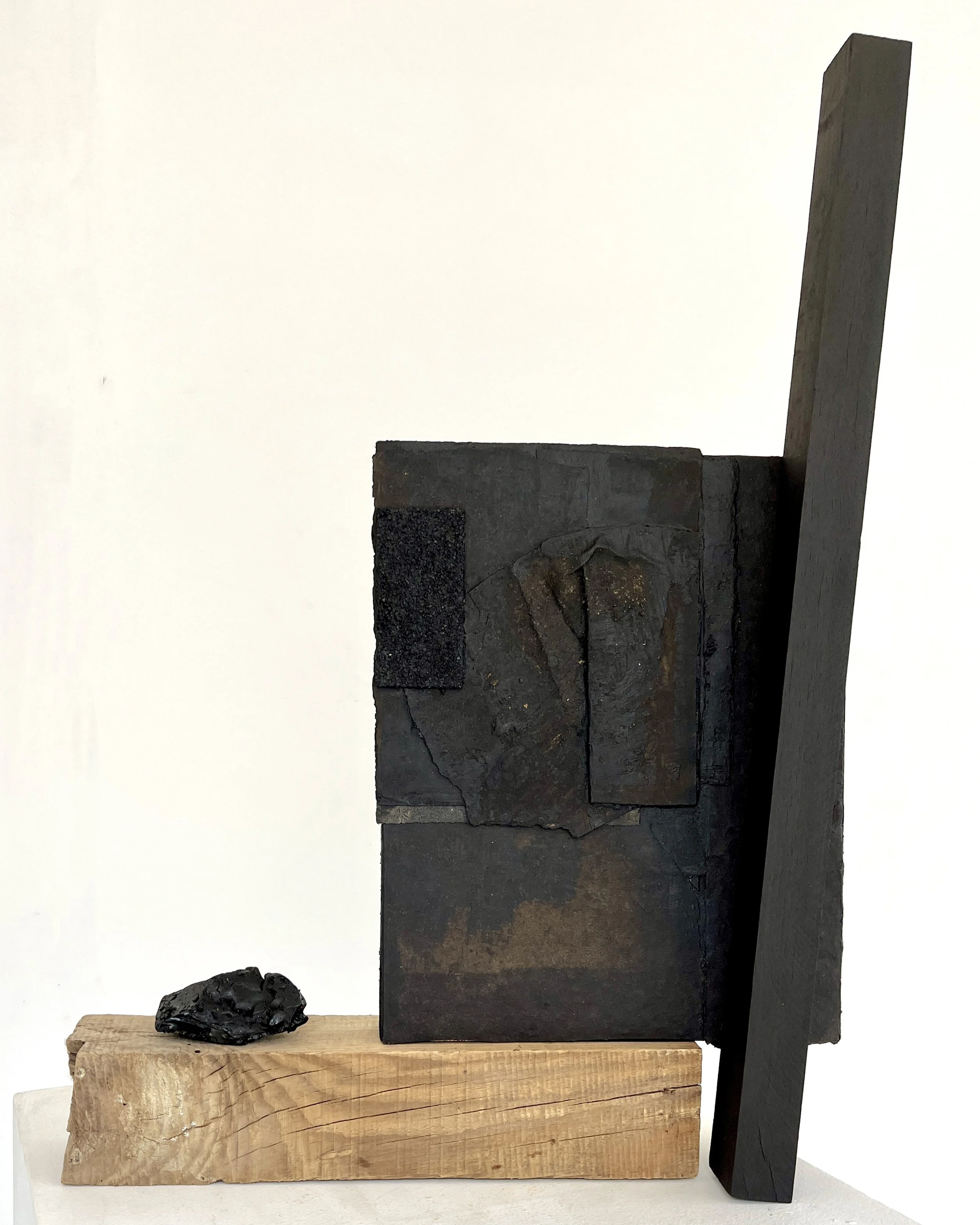 so many years - 28x20x6 in, reclaimed wood, asphalt shingles, tar, tar paper, earth, ink, chapapote, 2024