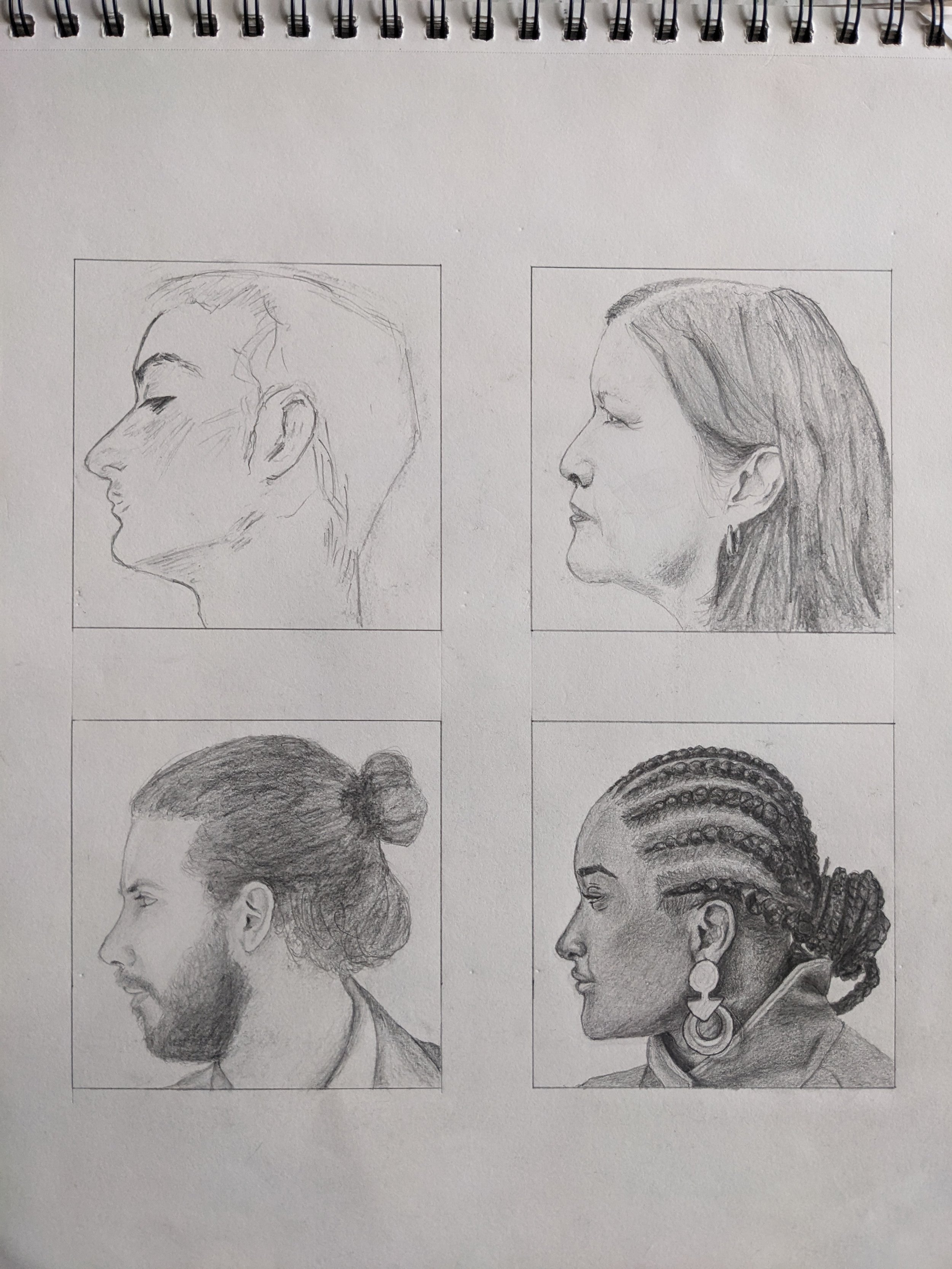 'Faces'. My first attempt at portrait drawing. Graphite pencil