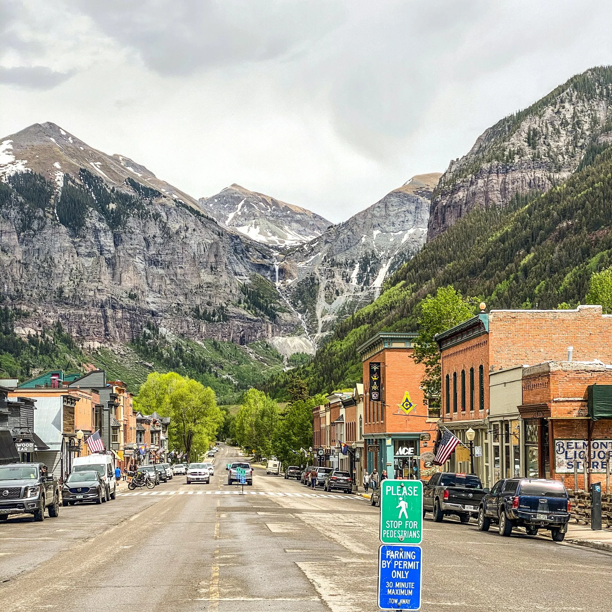Downtown Telluride, Colorado with San Juan Mountains and Bridal Veil Falls in the background.