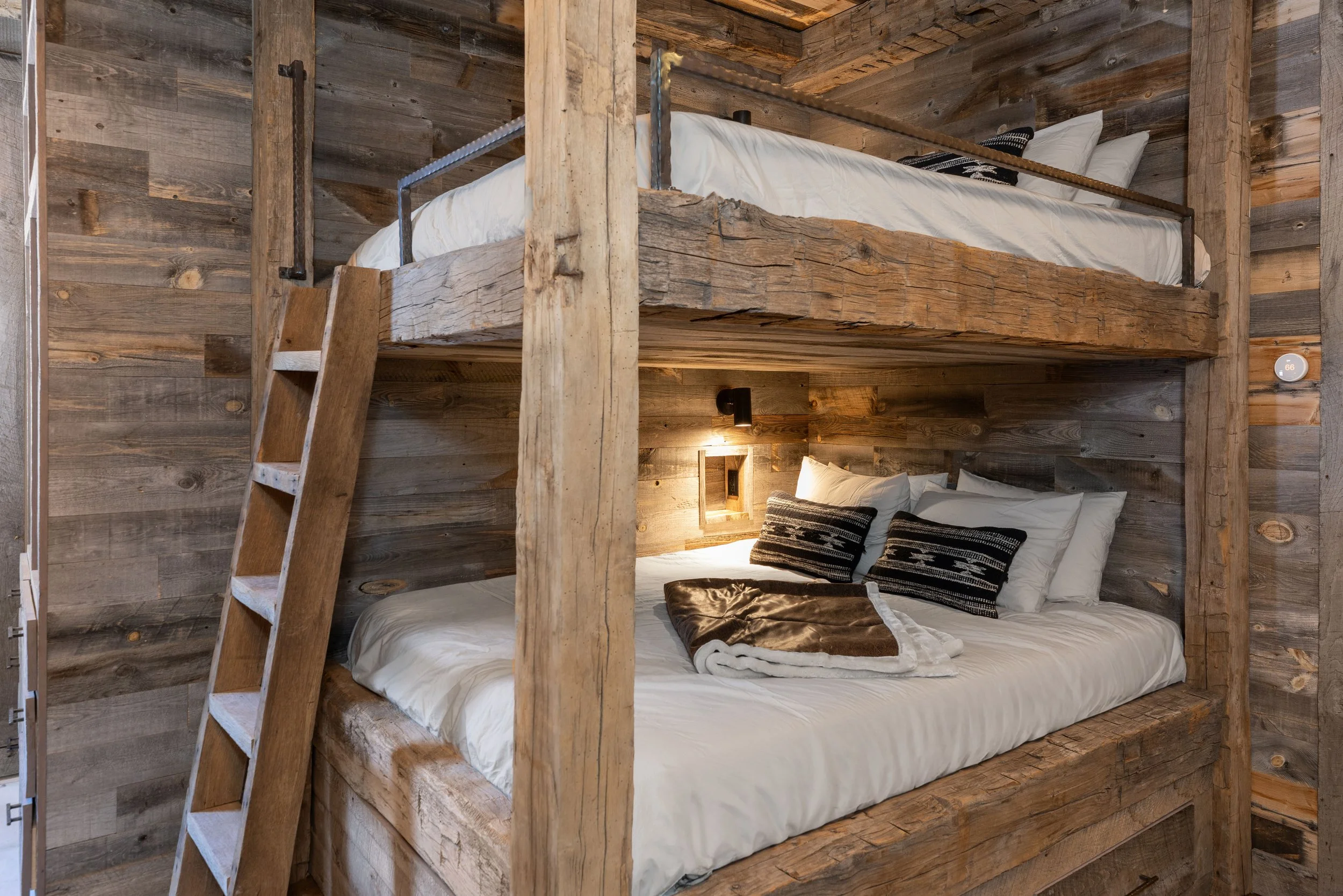 Custom built-in reclaimed wood bunk beds in luxury Telluride, Colorado mountain home remodel.