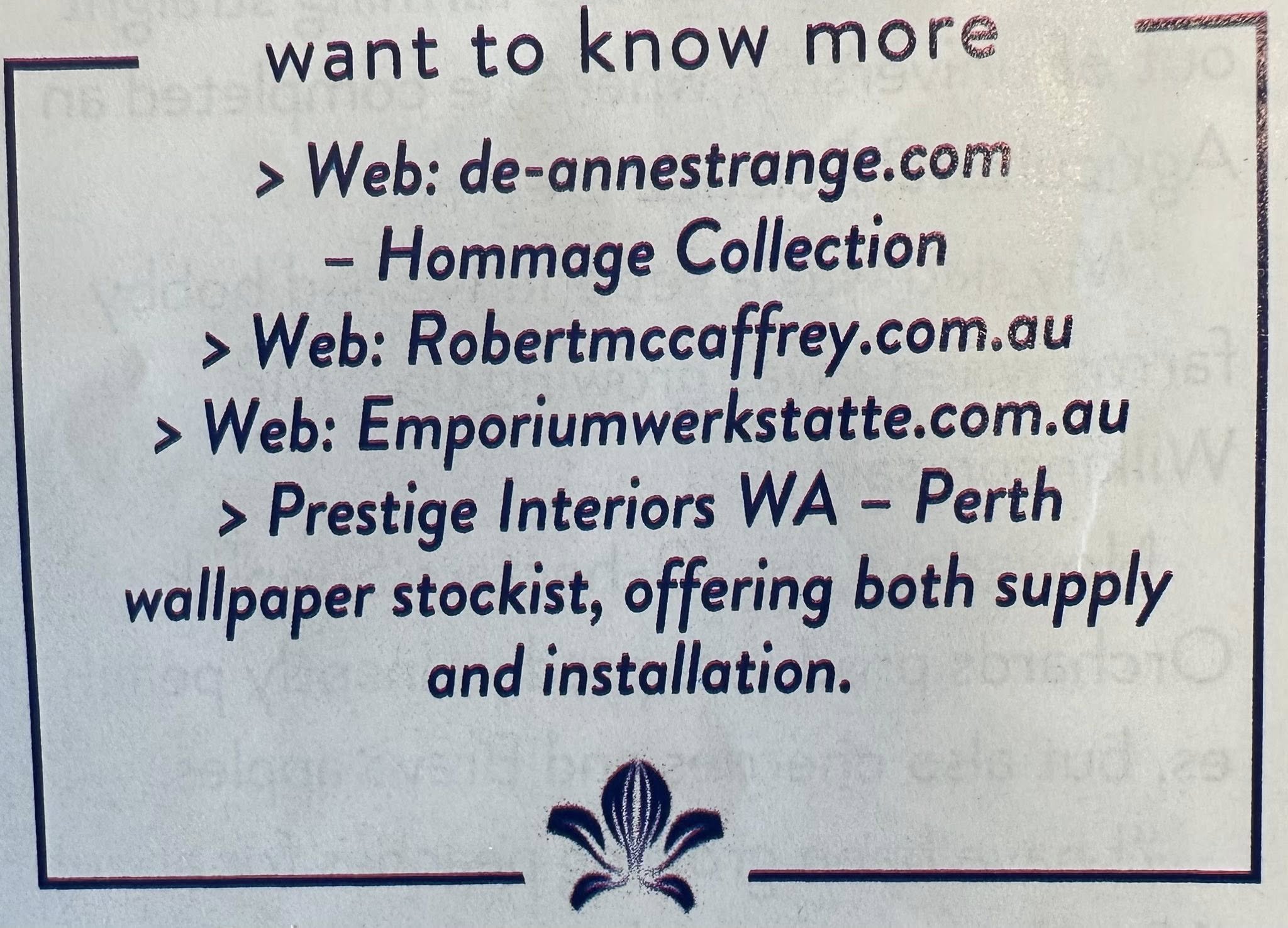 Close-up of a printed paper with web addresses and text, including 'want to know more', 'Web: de-annestrange.com', 'Web: Robertmccaffrey.com.au', and 'Web: Emporiumwerkstatt.com.au'. There is a small decorative flower illustration at the bottom.