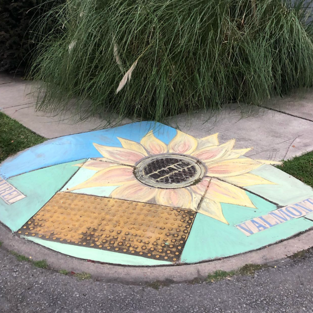 Sunflower chalk art on Laurel Street