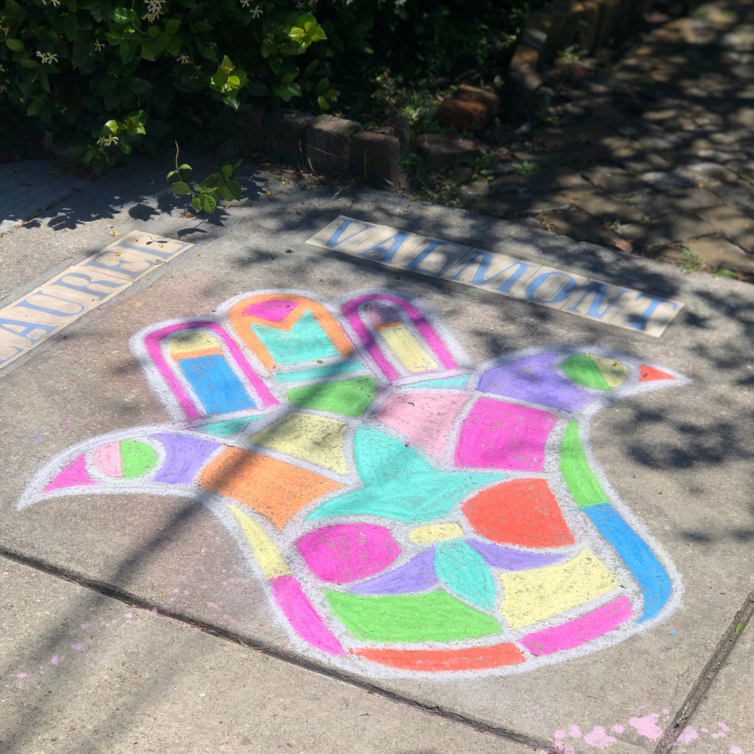 Hamsa chalk art on Laurel Street