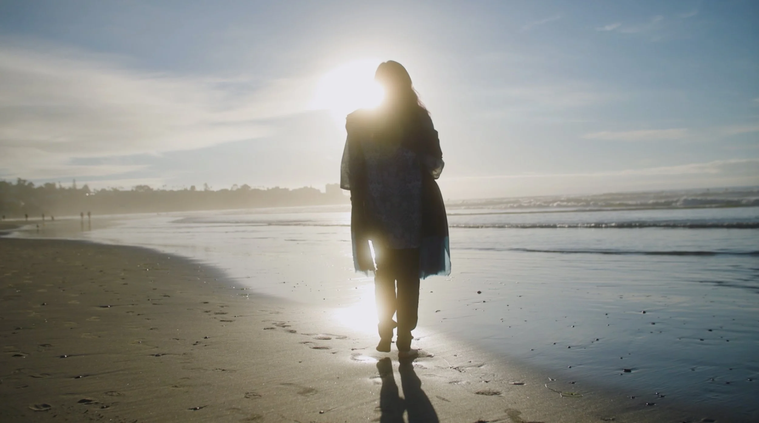 shamini backlit beach still.jpg