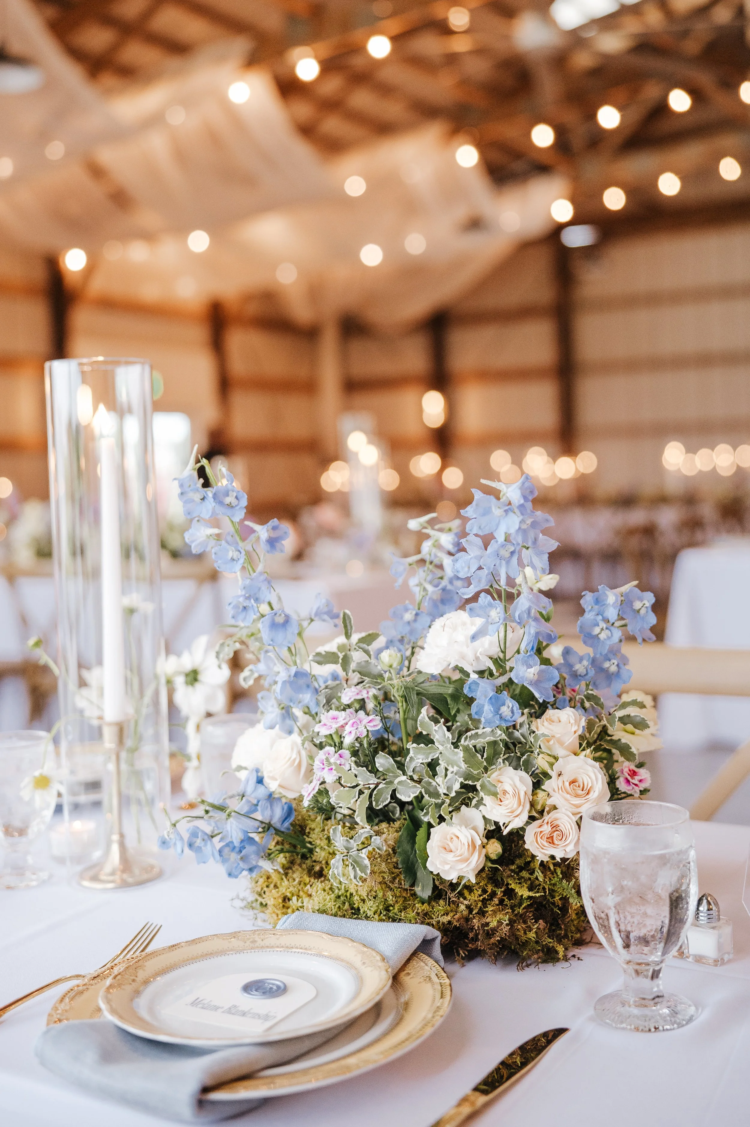 Reception details inside the vintage barn