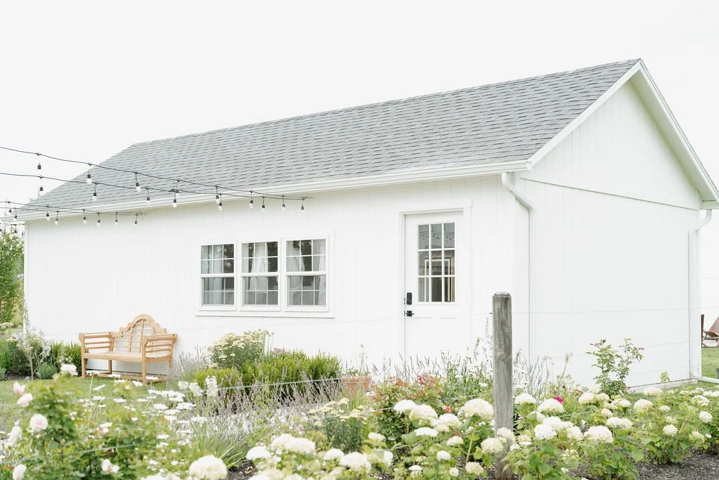 Bridal suite exterior surrounded by gardens at Aspen & Alston wedding venue in Ohio