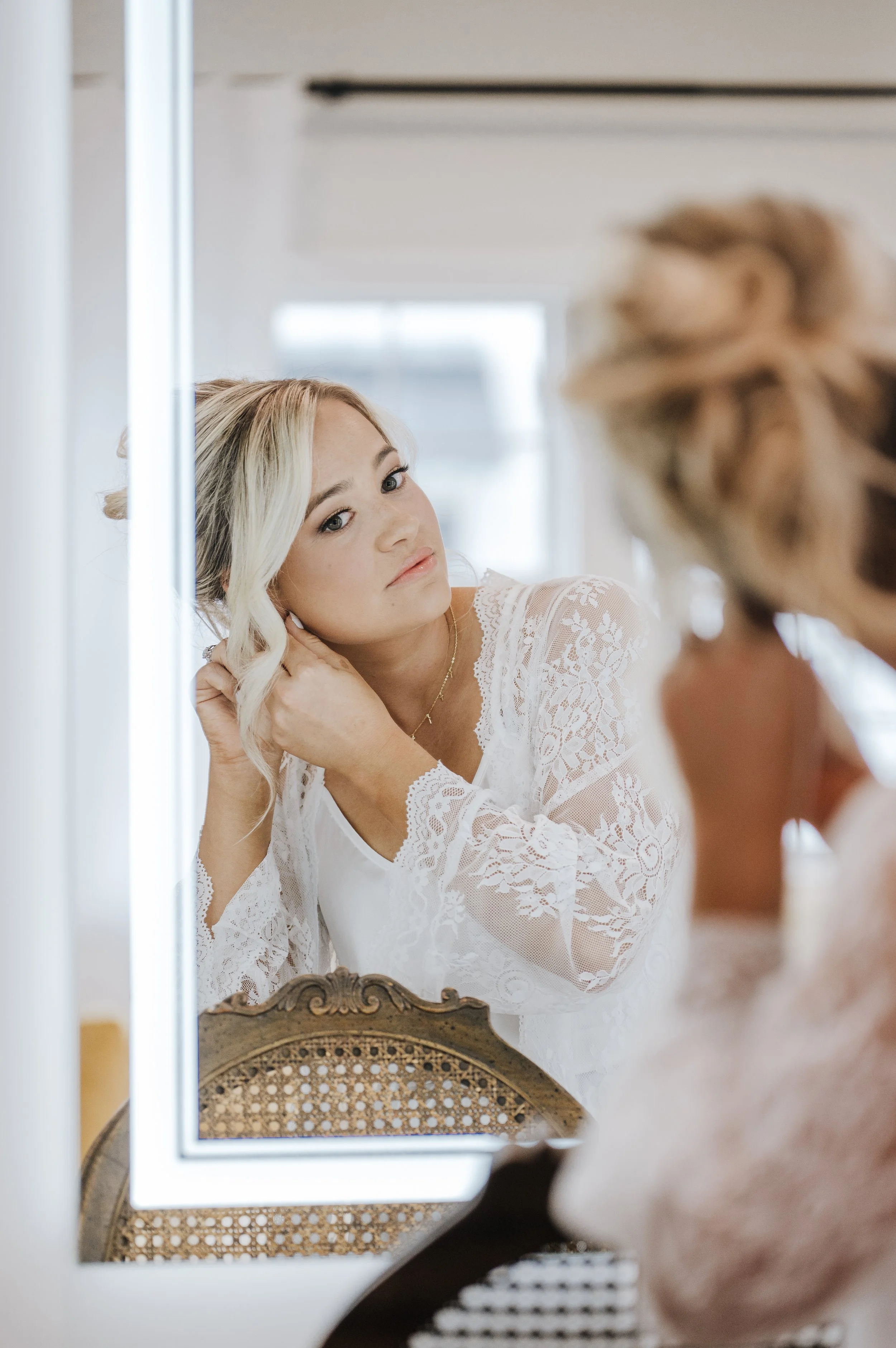 Bride getting ready in the bridal suite
