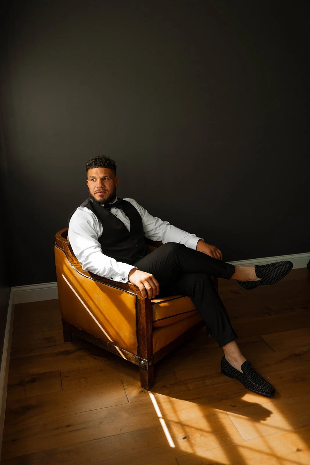 Editorial groom portraits inside Aspen & Alston groom’s getting ready suite